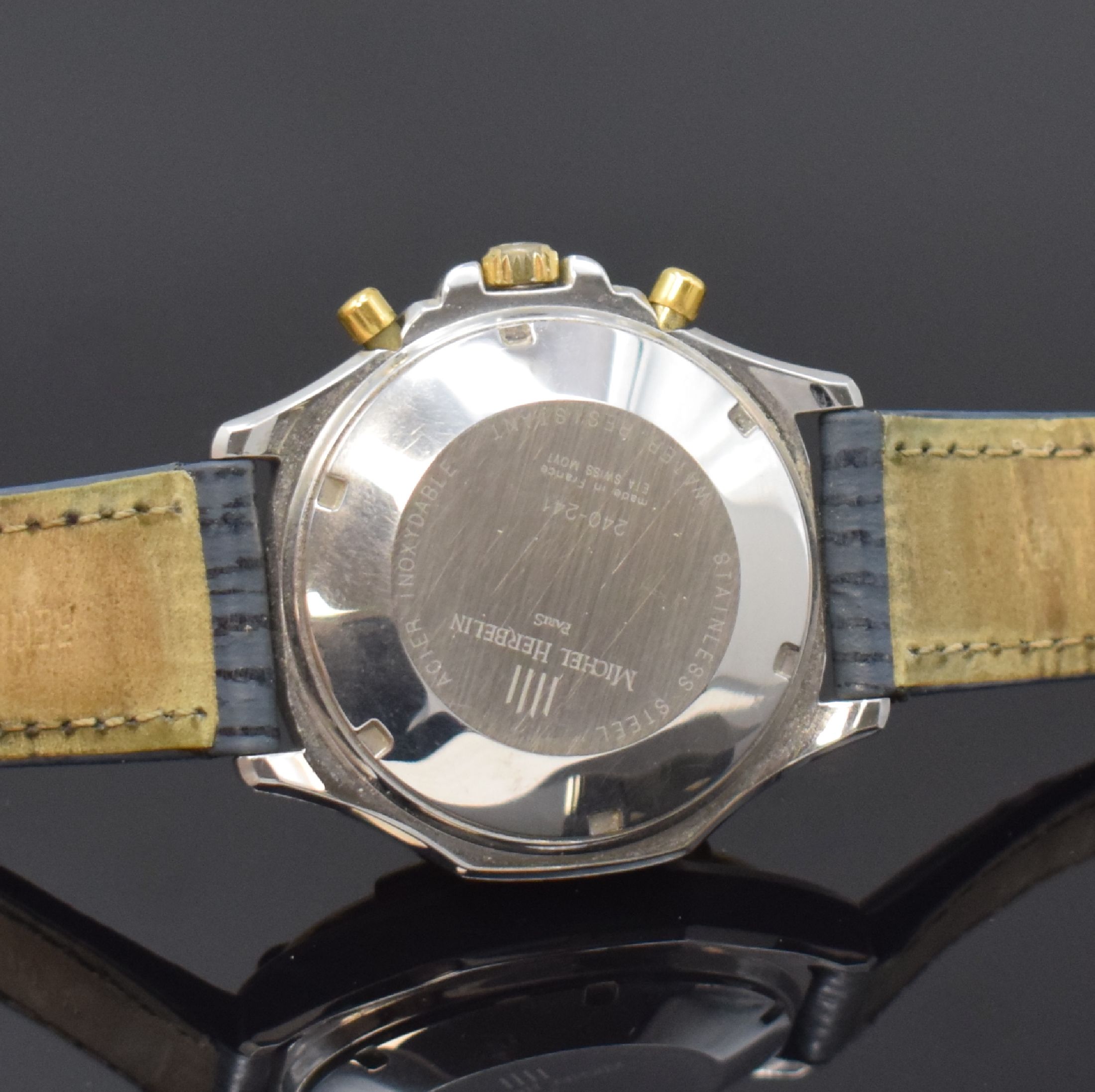 Detail d: MICHEL HERBELIN Armbandchronograph Serie Safari, Automatik, Schweiz um 1990, Edelstahlgeh., Boden und Krone verschr., teilverg. Lün. mit ...