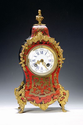 Image 26718987 - Small Boulle clock with console, France, around 1900, curved wooden case, ebonized on the sides, decorated with applications using the Boulle technique on the front side, orig. Base, glass lid, enamel dial with style hands,pendulum movement according to: Japy, half- hour strike on bell, orig. Pendulum, key missing, running. approx. 1 week, work to be fixed, bowl missing, housing unstable, height with console approx. 46cm, condition of movement/housing 2-3