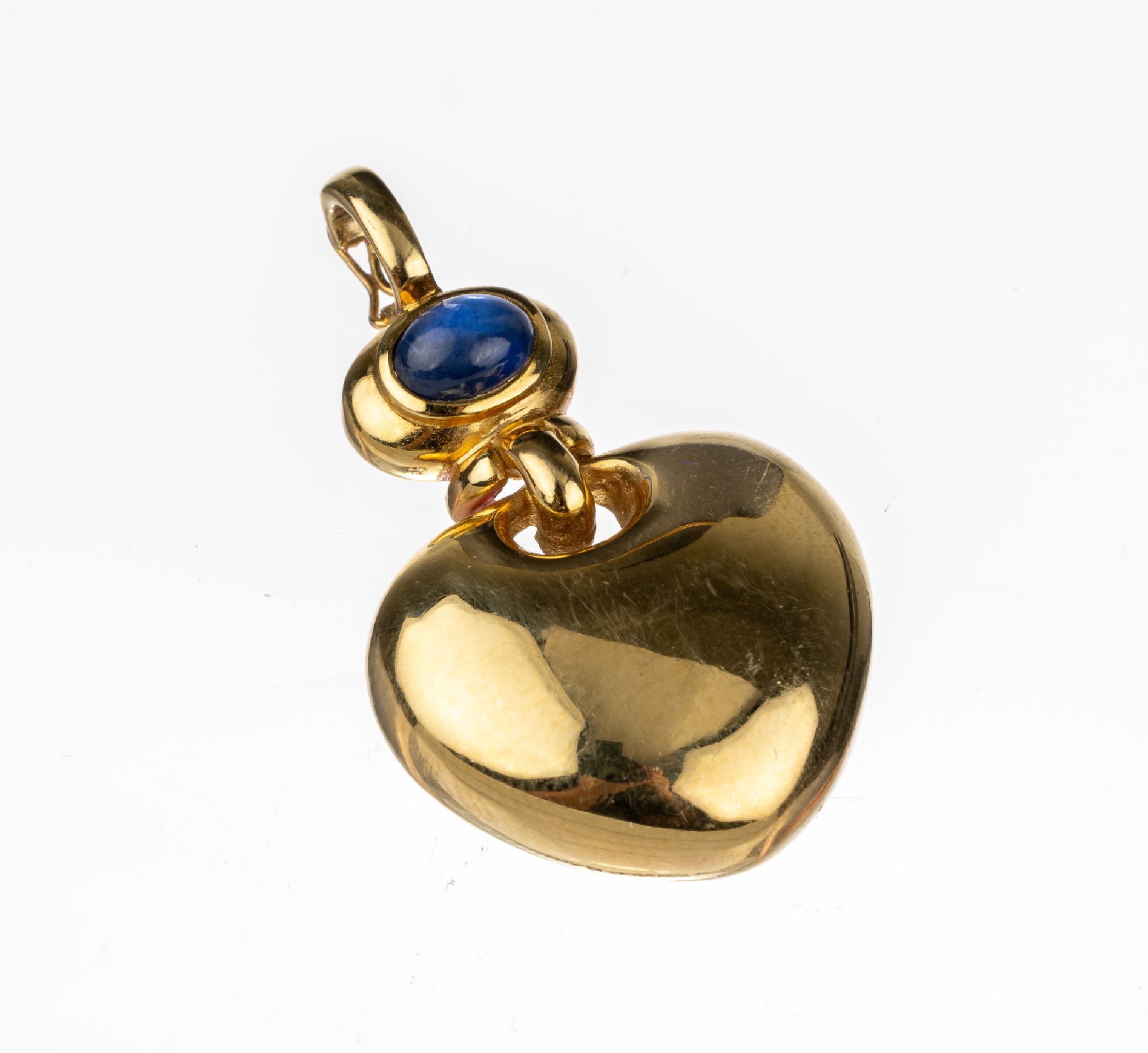 18 kt Gold Saphir-Anhänger "Herz", GG 750/000 gepr., schlichte Gestaltung, ovaler Saphir-Cabochon ca. 1.0 ct, ca. 4 x 2.5 cm, ca. 10.4 g