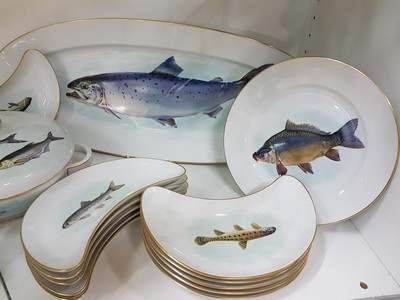 26719005a - Fish service, Rosenthal, 20th century, porcelain, hand-painted, naturalistic fish decoration, painter Königer, some with names of the fish, gold rim, 12 flat plates, 12 bone plates, gravy boat and lidded bowl (with cracks/damage inside), large pike plate