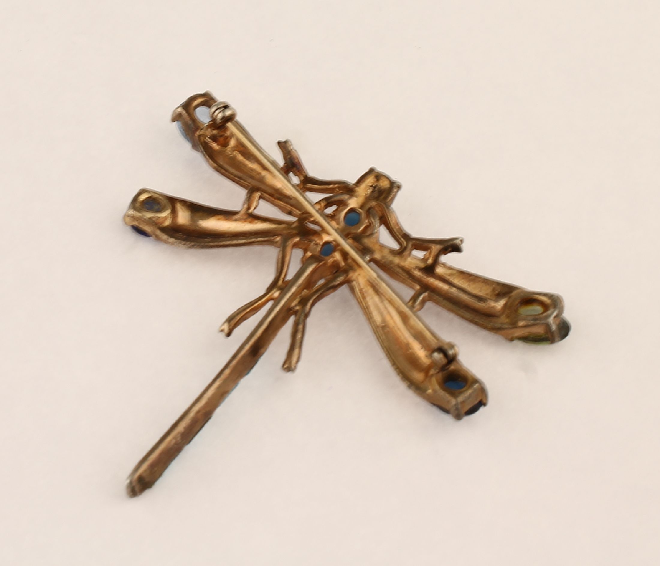 Detail a: TRIFARI Modeschmuckbrosche "Libelle", Metall verg., bes. mit buntem und farblosem Straß,facett. und Cabochons, Tragespuren, L. ca. 5.5cm, ...