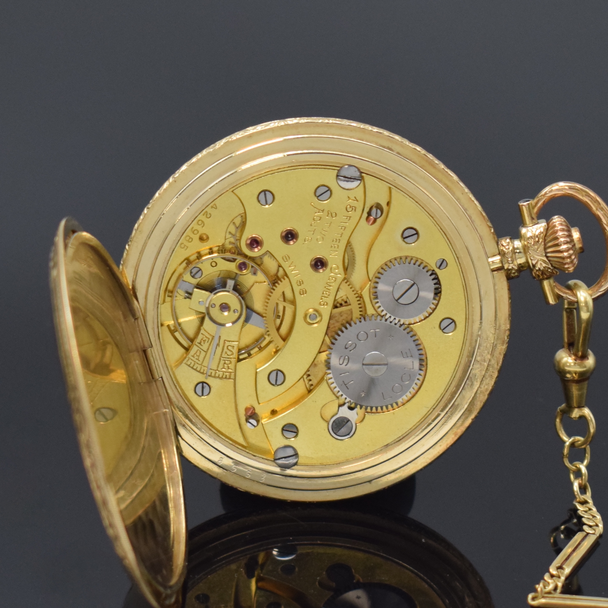 Detail g: Taschenuhrkette in GG 585/000 an vergoldeter Tissot Savonette, Kette Gew. ca. 13g, L. ca. 47 cm, Savonette Schweiz um 1930, Geh. guill. und grav., ...