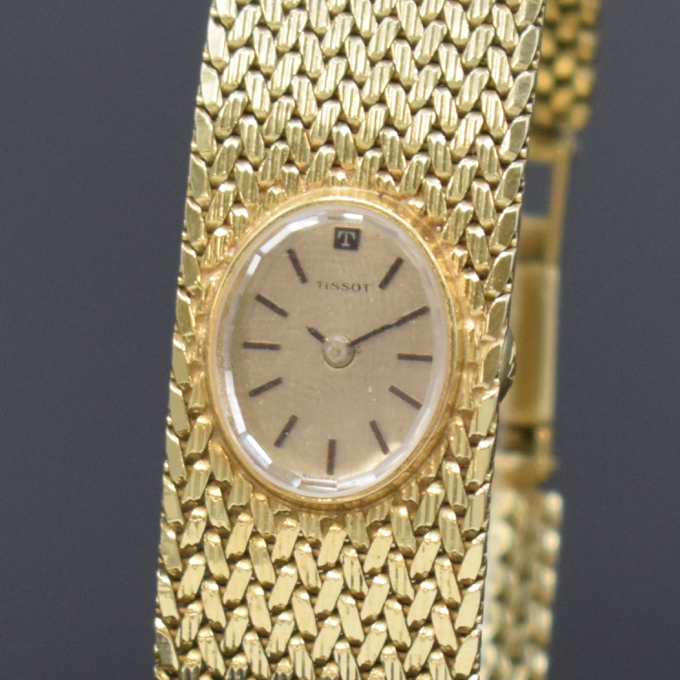 Detail a: TISSOT Damenarmbanduhr in GG 585/000, Schweiz um 1975, quarz, Boden aufgedr., Zifferbl. m. aufges. Std.-Ind., schwarze Zeiger, D. ca. 17 cm, L. ca. ...