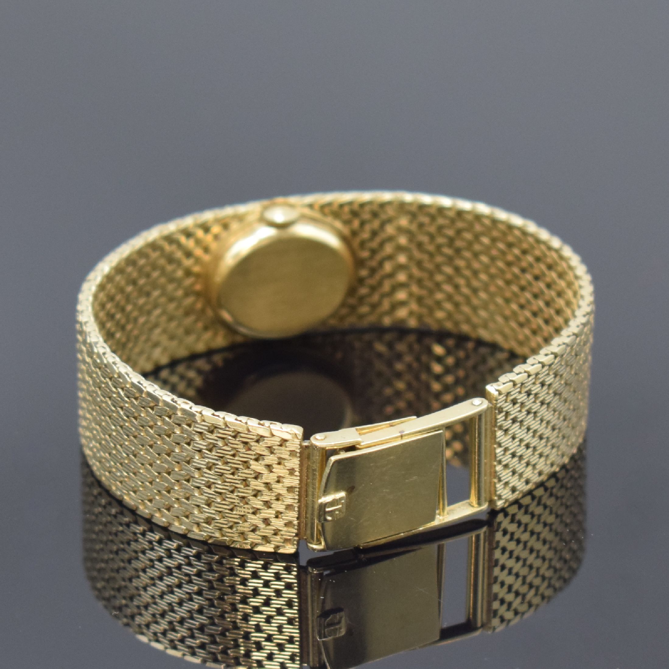 Detail b: TISSOT Damenarmbanduhr in GG 585/000, Schweiz um 1975, quarz, Boden aufgedr., Zifferbl. m. aufges. Std.-Ind., schwarze Zeiger, D. ca. 17 cm, L. ca. ...