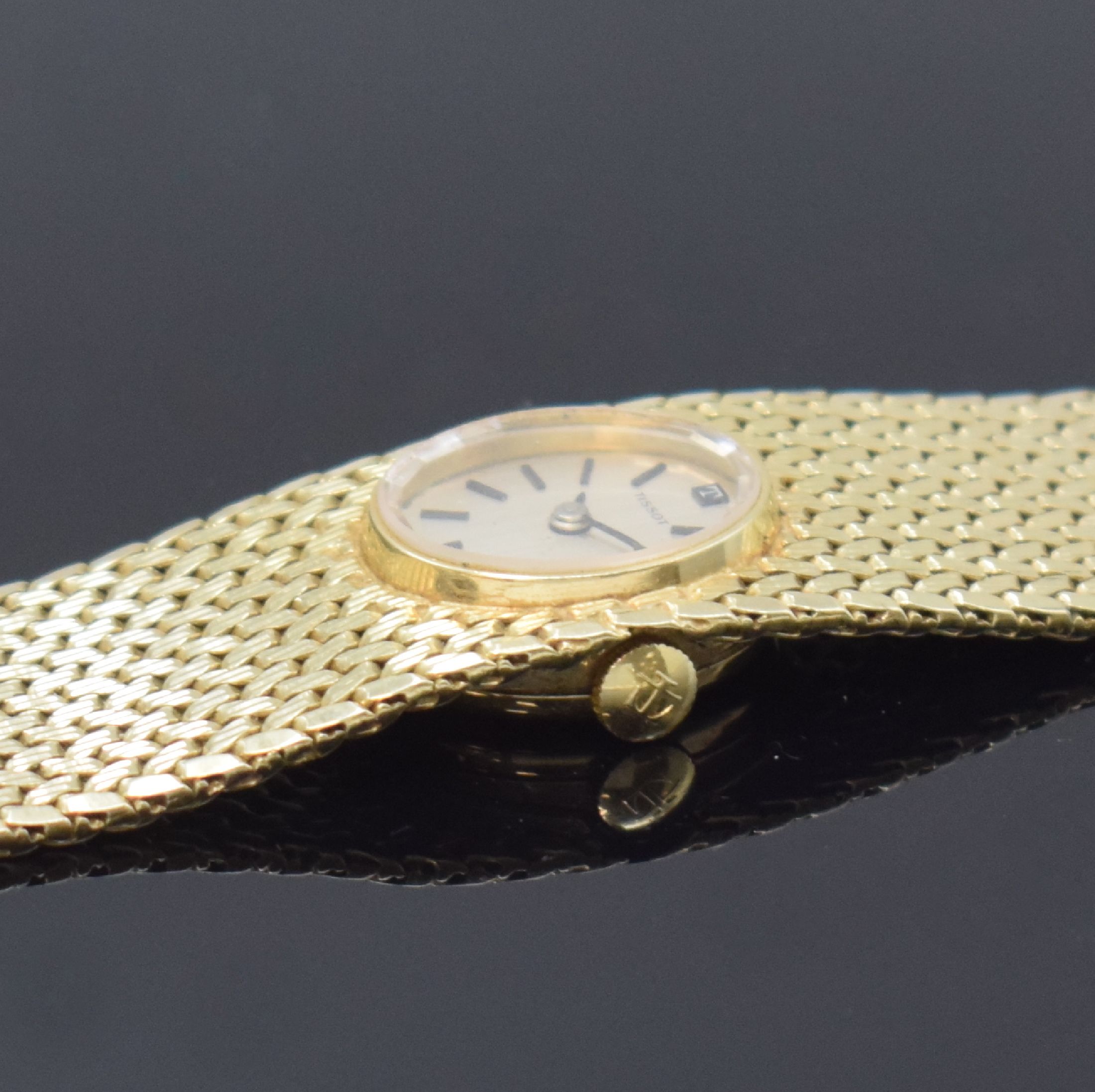 Detail d: TISSOT Damenarmbanduhr in GG 585/000, Schweiz um 1975, quarz, Boden aufgedr., Zifferbl. m. aufges. Std.-Ind., schwarze Zeiger, D. ca. 17 cm, L. ca. ...