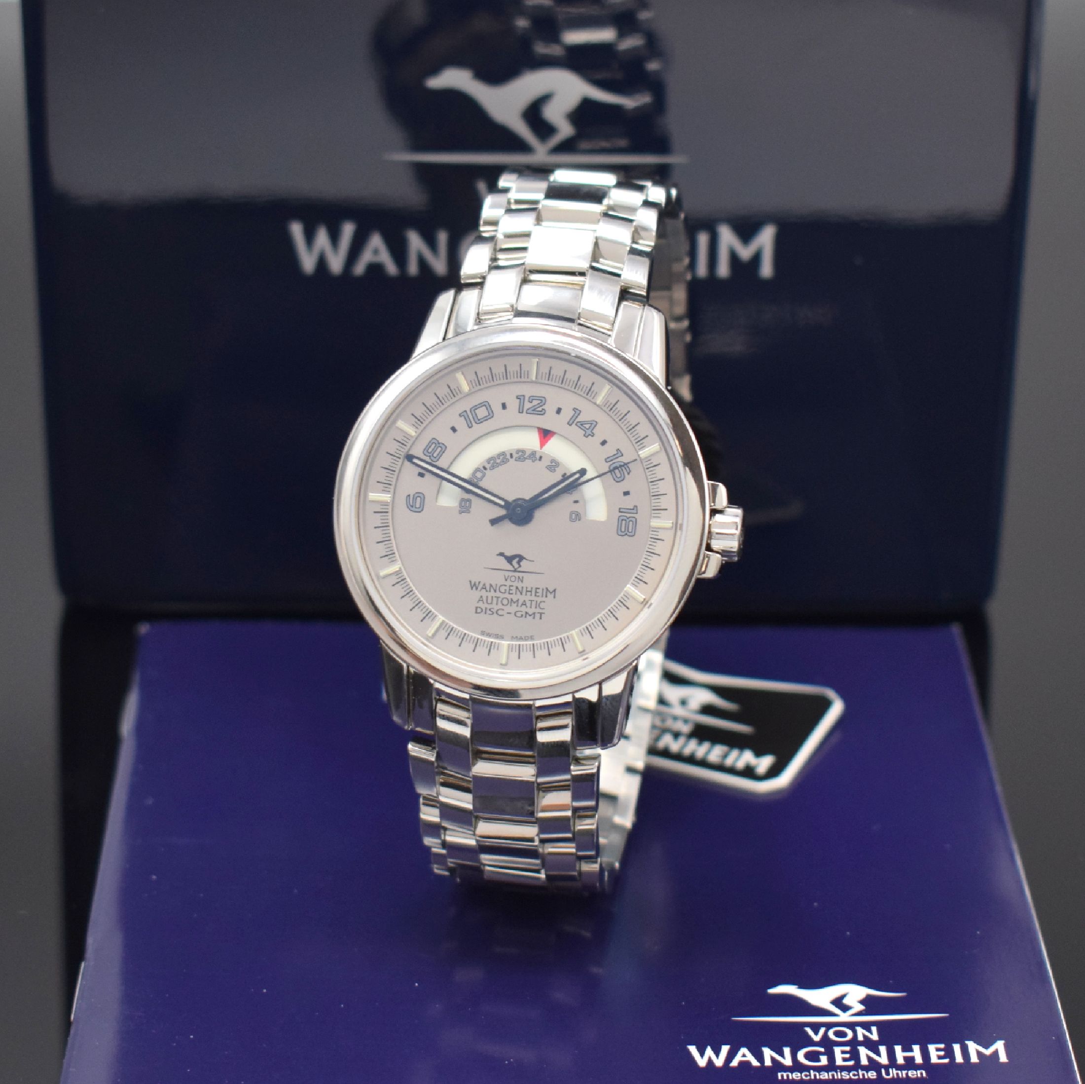 VON WANGENHEIM Herrenarmbanduhr Serie SALUKI Modell Disc-GMT Referenz 02.25.S, Schweiz um 2015, Automatik, Edelstahlgeh. inkl. Gliederband m. dopp. ...