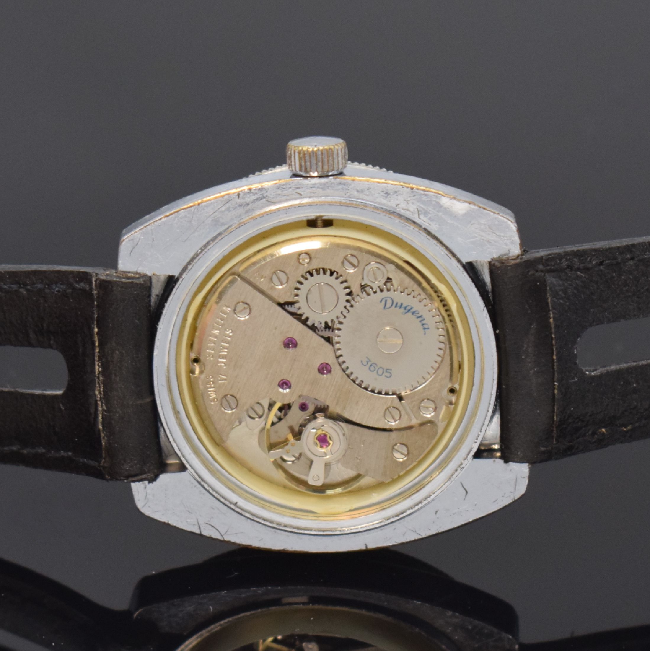 Detail d: DUGENA Sport Herrenarmbanduhr, Handaufzug, Schweiz um 1968, verchr. Geh., Edelstahlboden verschr., Lünette m. 60er Teilung beids. drehb., schwarzes ...