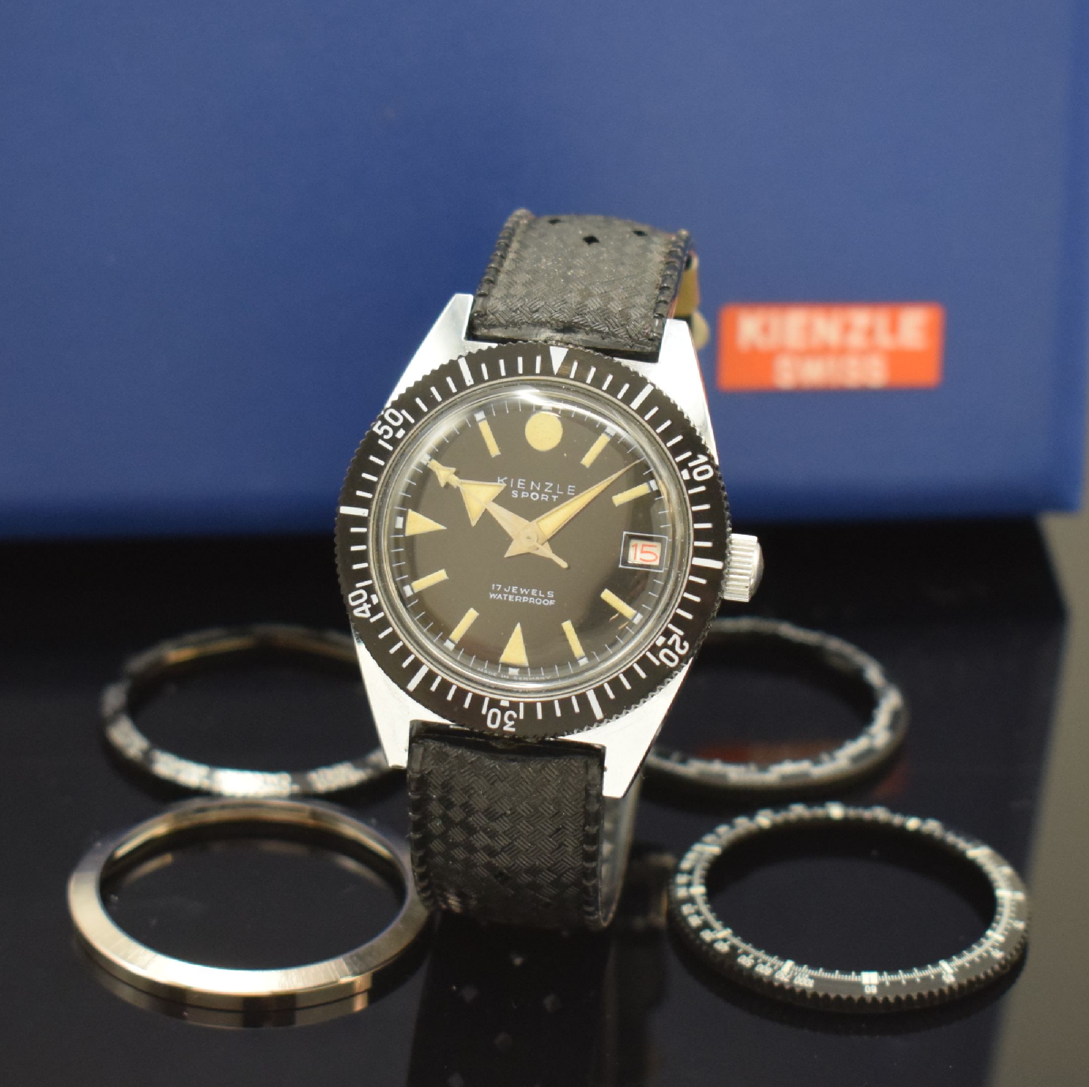 KIENZLE Sport Herrenarmbanduhr mit original Etui und Wechsel-Lünetten, Handaufzug, Deutschland 1960er Jahre, verchr. Geh., Tropic-Armband, verschr. ...