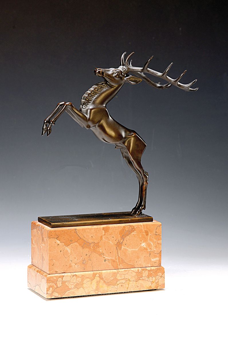Eduard Voith, springender Hirsch, Bronzeskulptur auf Marmorsockel, linkes Geweih nicht ganz fest, signiert ED.VOITH, ca. 32x17 cm