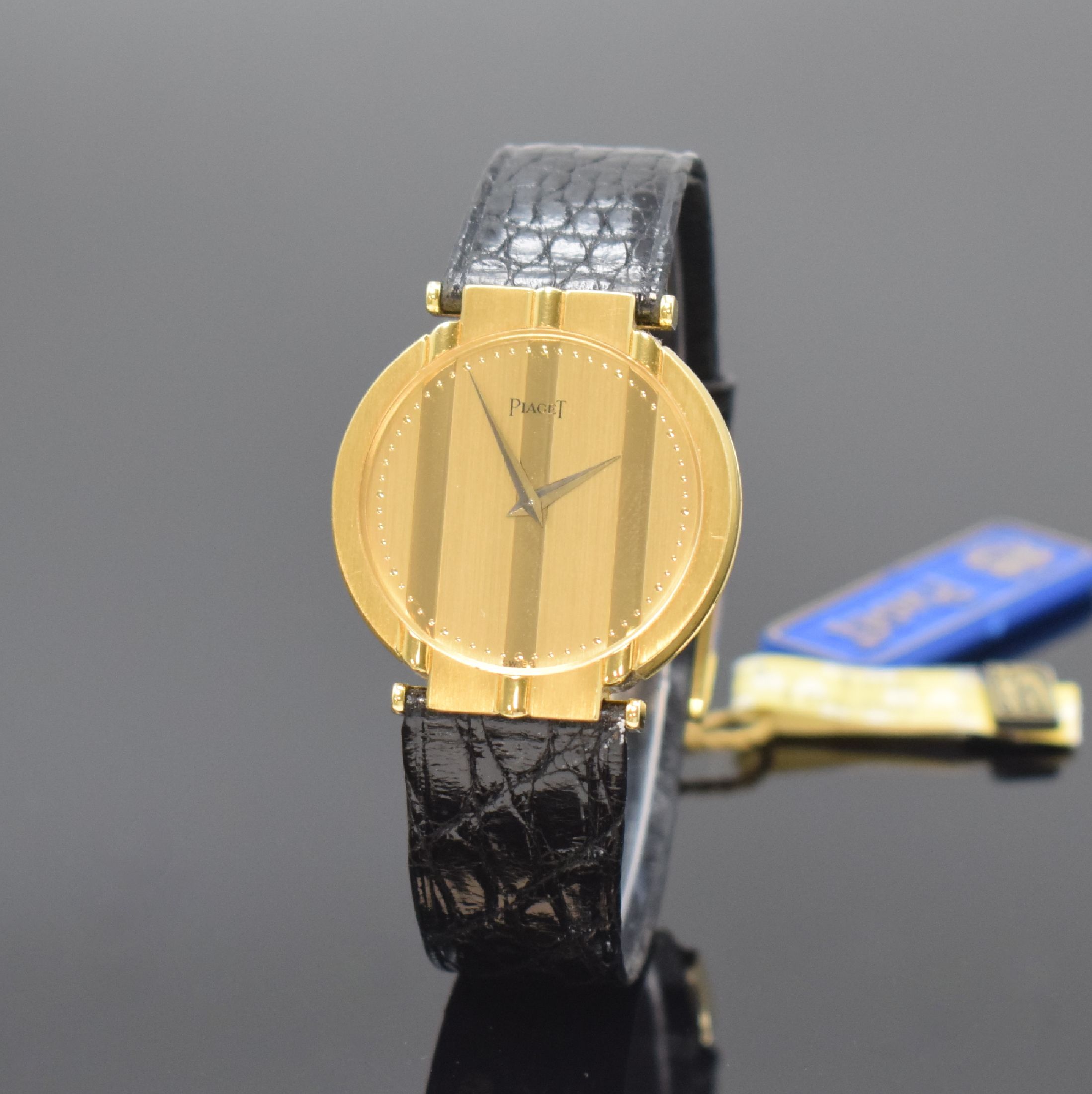 PIAGET Polo Armbanduhr in GG 750/000 Referenz 7673, Schweiz um 1990, orig. Lederband m. orig. GG 750/000 Dornschl., Boden 4-fach verschr., quarz, ...