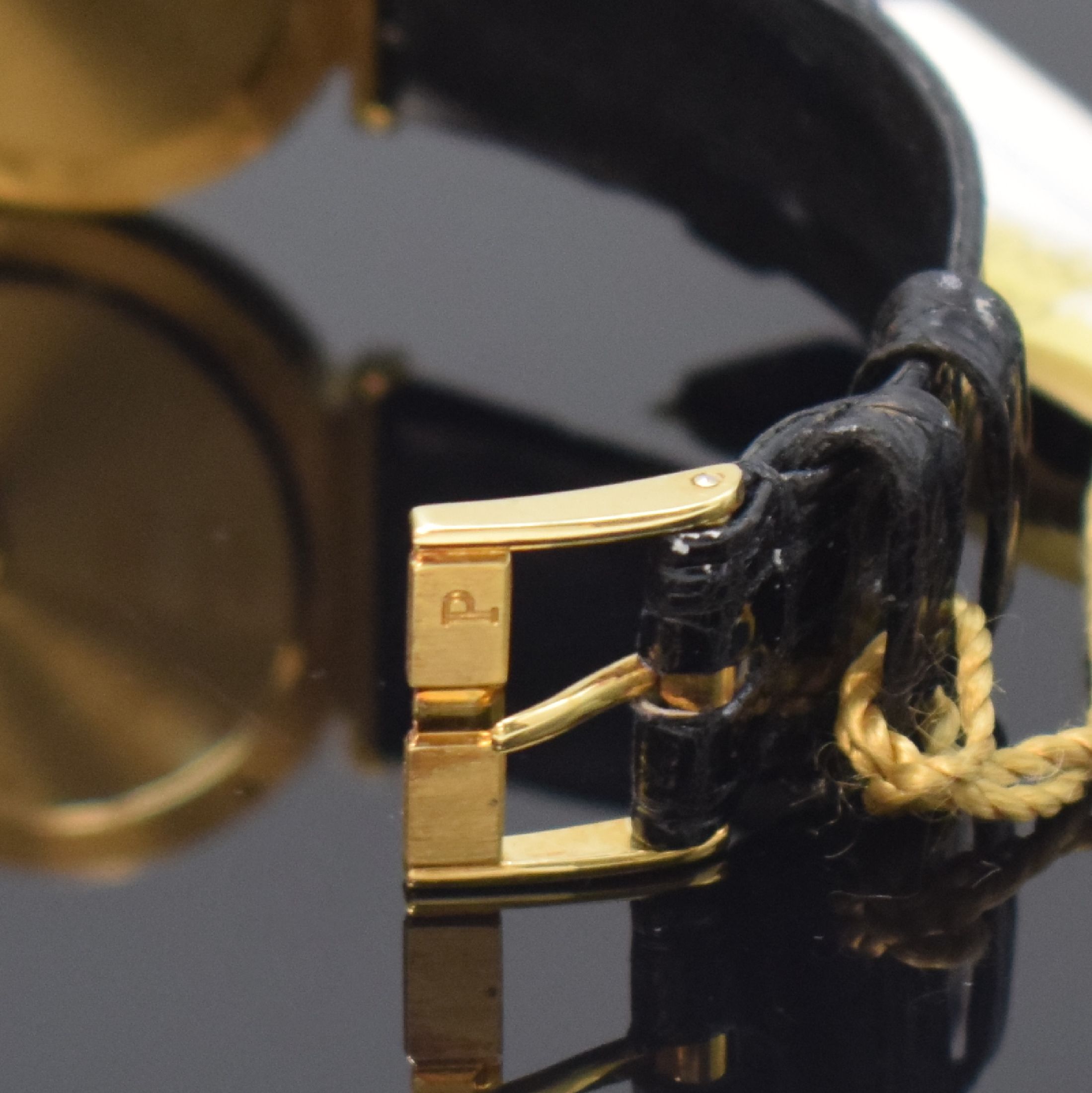 Detail b: PIAGET Polo Armbanduhr in GG 750/000 Referenz 7673, Schweiz um 1990, orig. Lederband m. orig. GG 750/000 Dornschl., Boden 4-fach verschr., quarz, ...
