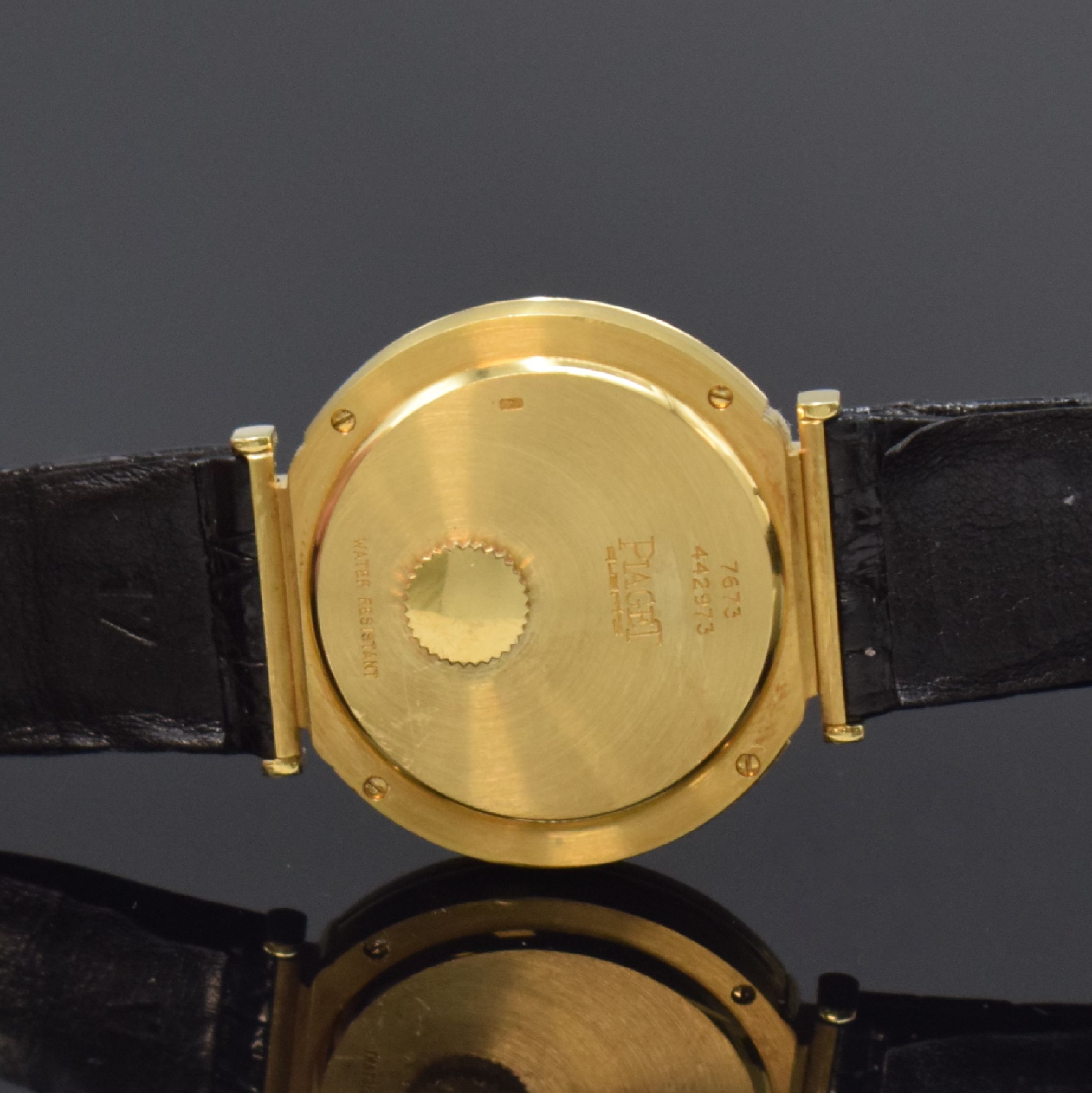 Detail c: PIAGET Polo Armbanduhr in GG 750/000 Referenz 7673, Schweiz um 1990, orig. Lederband m. orig. GG 750/000 Dornschl., Boden 4-fach verschr., quarz, ...