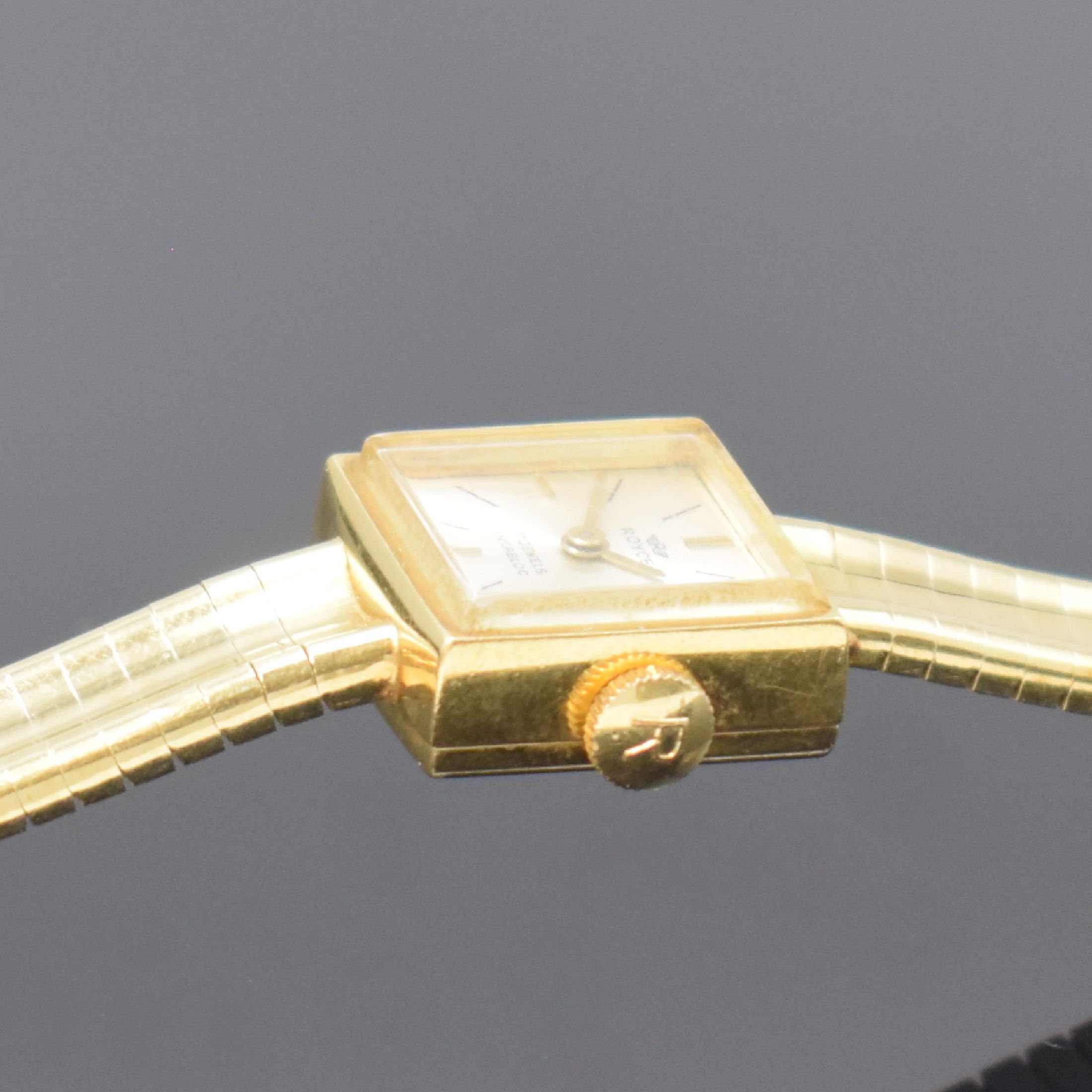 Detail c: ROYCE Damenarmbanduhr in GG 585/000, Schweiz 1960er Jahre, Handaufzug, Boden aufgedr., silb. Zifferbl. altersbed. l. fl., Kal. AS 1677, 17 St., M. ...