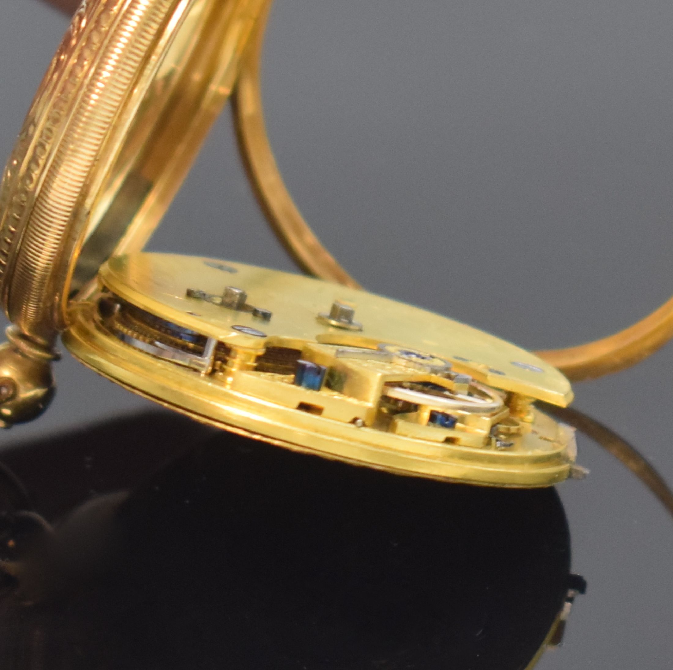 Detail g: F.H. GOULDING kleine Taschenuhr in GG 750/000, Schweiz um 1870, Geh. m. Münzrand, rücks. floral grav., Metallzifferbl. teils floral grav., röm. ...