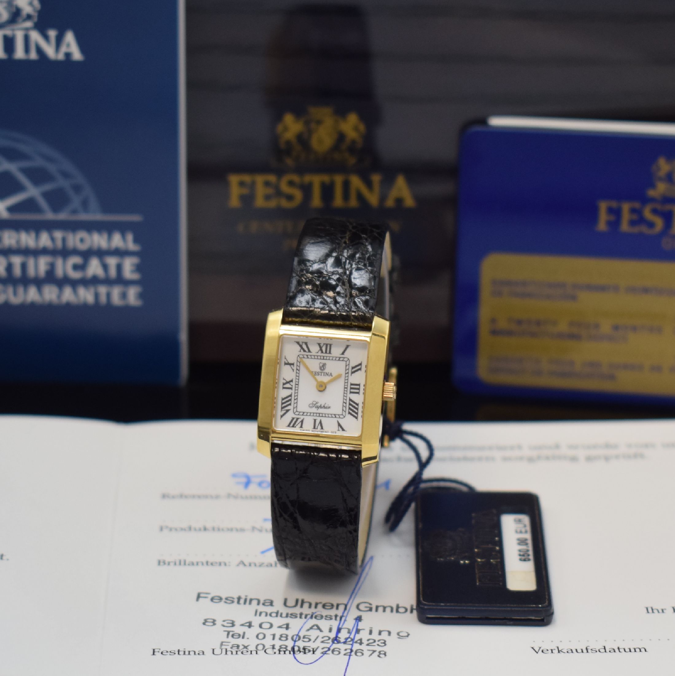 FESTINA Damenarmbanduhr in GG 750/000, Schweiz um 2015, quarz, Boden 4-fach verschr., orig. Lederband m. verg. Dornschl., weißes Zifferbl. m. röm. ...