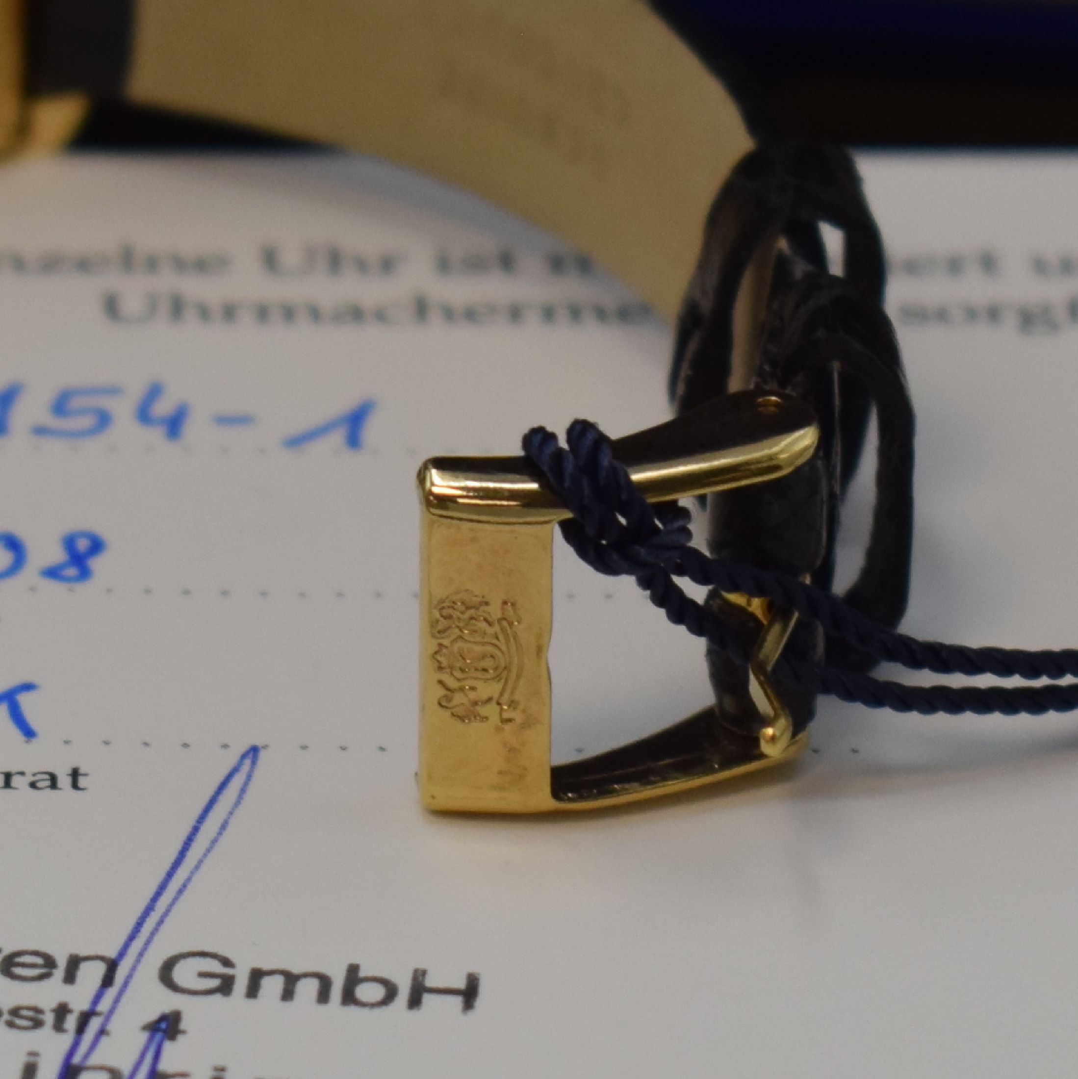 Detail b: FESTINA Damenarmbanduhr in GG 750/000, Schweiz um 2015, quarz, Boden 4-fach verschr., orig. Lederband m. verg. Dornschl., weißes Zifferbl. m. röm. ...