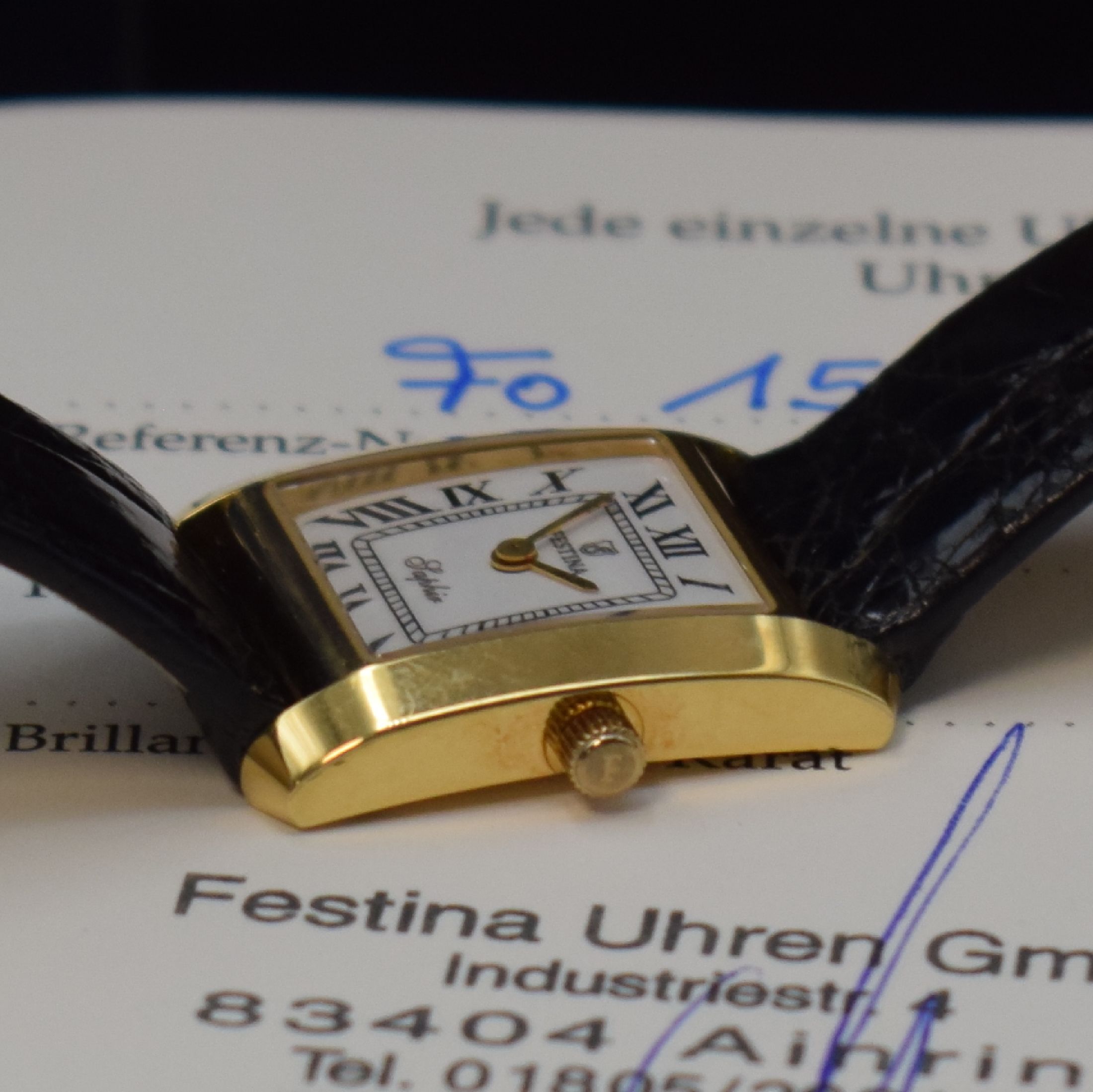 Detail d: FESTINA Damenarmbanduhr in GG 750/000, Schweiz um 2015, quarz, Boden 4-fach verschr., orig. Lederband m. verg. Dornschl., weißes Zifferbl. m. röm. ...