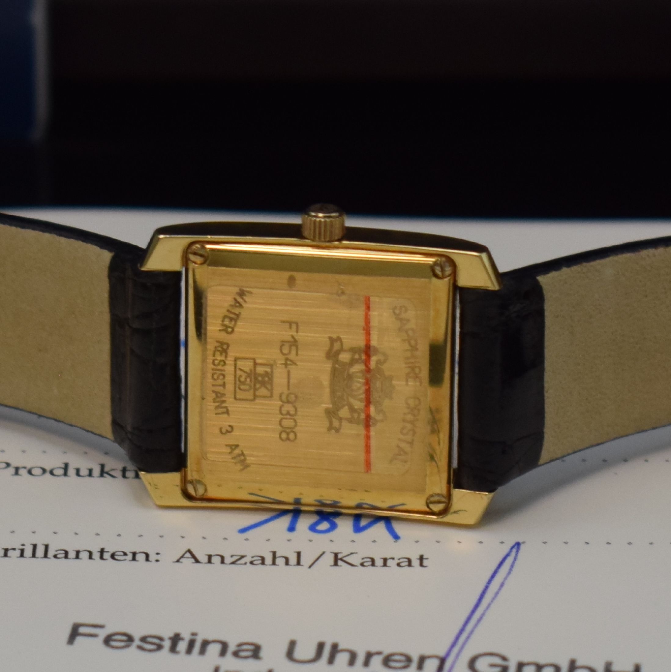 Detail e: FESTINA Damenarmbanduhr in GG 750/000, Schweiz um 2015, quarz, Boden 4-fach verschr., orig. Lederband m. verg. Dornschl., weißes Zifferbl. m. röm. ...