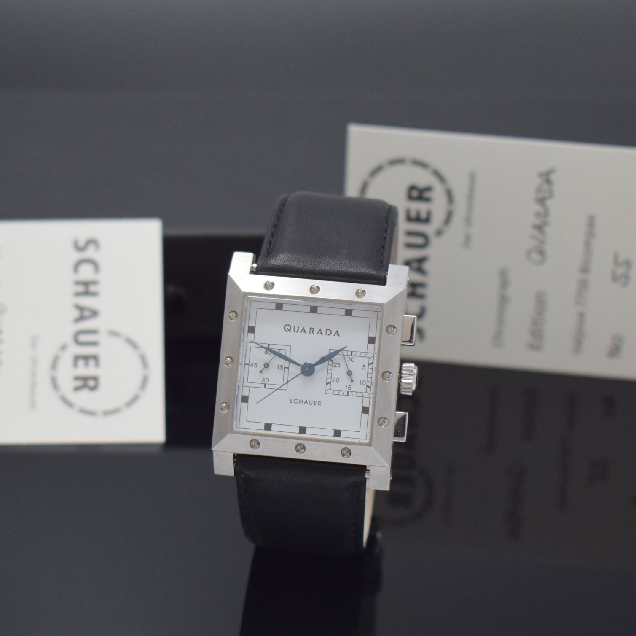 JÖRG SCHAUER Quarada Herrenchronograph in Stahl, Deutschland um 2000, Automatik, beids. vergl. Geh., Boden 8-fach verschr., weißes Zifferbl. m. ...