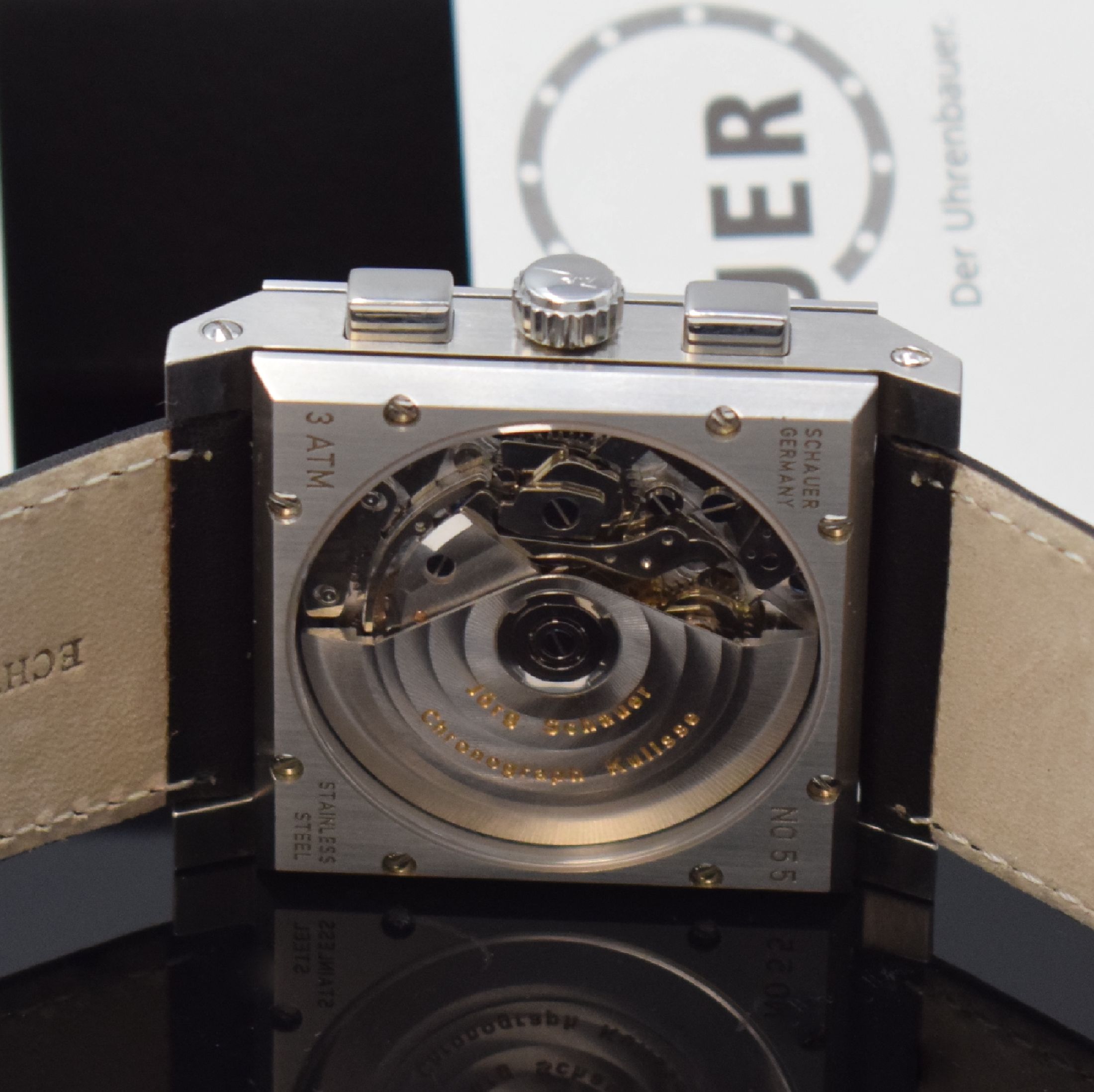 Detail c: JÖRG SCHAUER Quarada Herrenchronograph in Stahl, Deutschland um 2000, Automatik, beids. vergl. Geh., Boden 8-fach verschr., weißes Zifferbl. m. ...