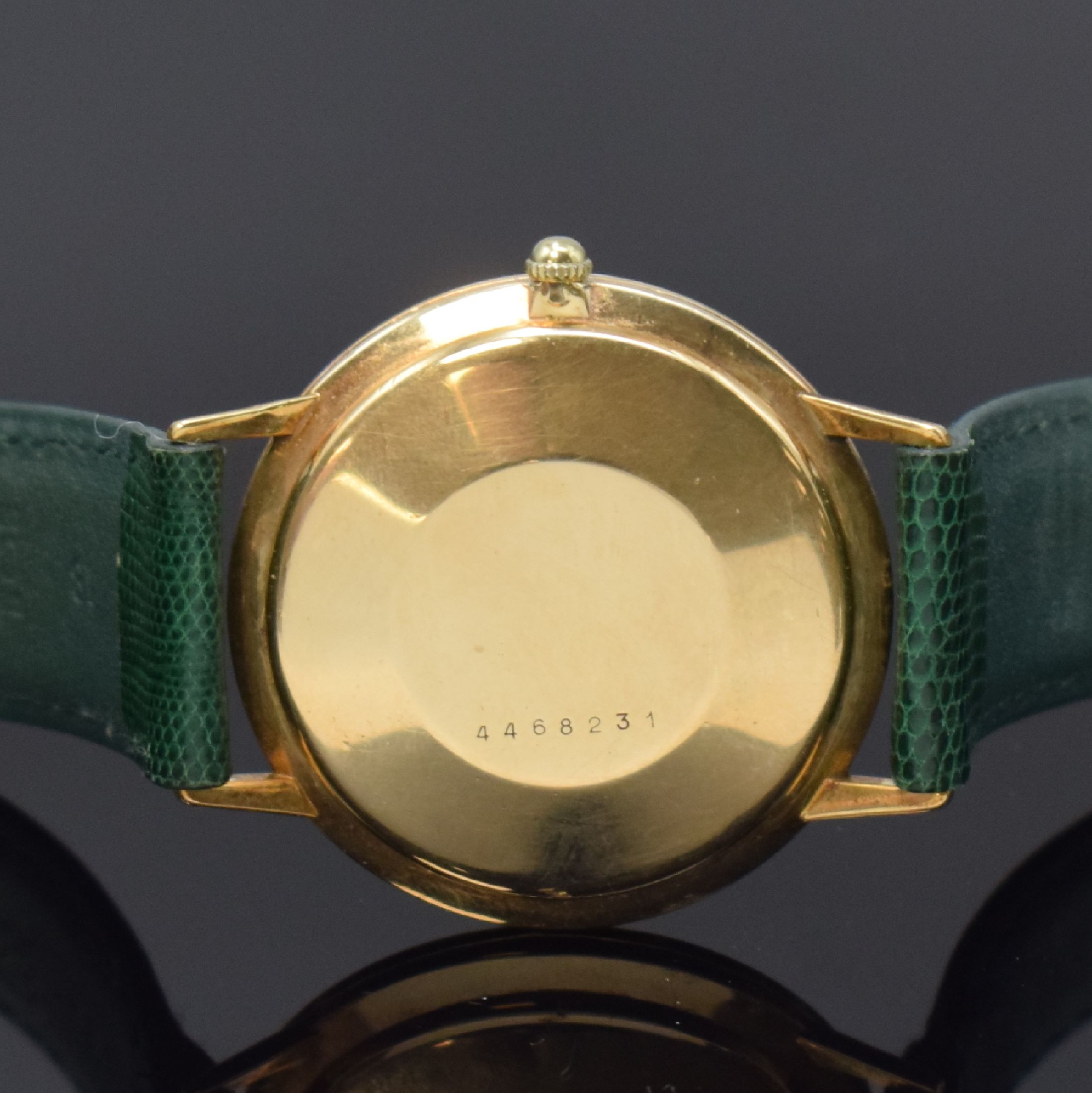 Detail c: ETERNA-MATIC Centenaire vergoldete Herrenarmbanduhr, Schweiz um 1960, Automatik, Boden u. Glasrand aufgedr., goldfarb. Zifferbl. m. aufges. ...