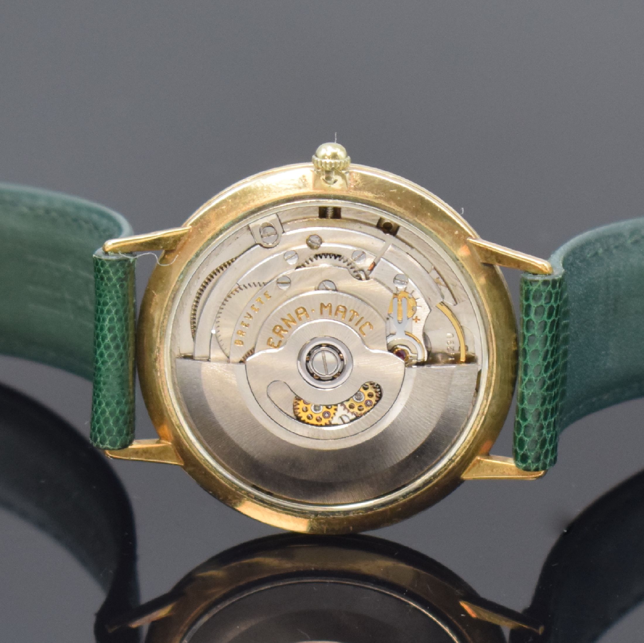 Detail d: ETERNA-MATIC Centenaire vergoldete Herrenarmbanduhr, Schweiz um 1960, Automatik, Boden u. Glasrand aufgedr., goldfarb. Zifferbl. m. aufges. ...