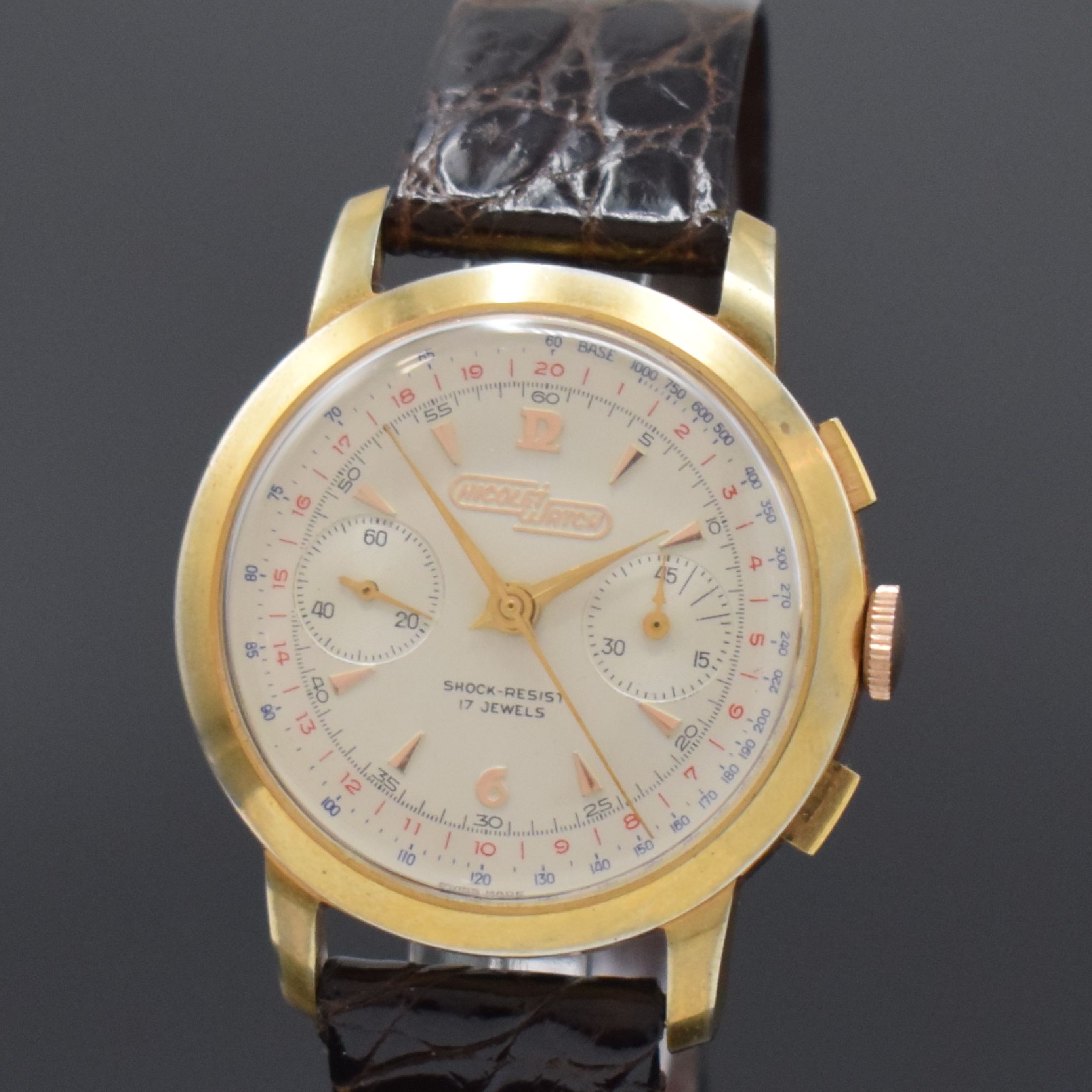 Detail a: NICOLET WATCH Herrenchronograph, Schweiz um 1960, Handaufzug, verg. Gehäuse, Stahlboden aufgedr., silb. Zifferbl. m. aufges. Std.- Ind., gold. ...