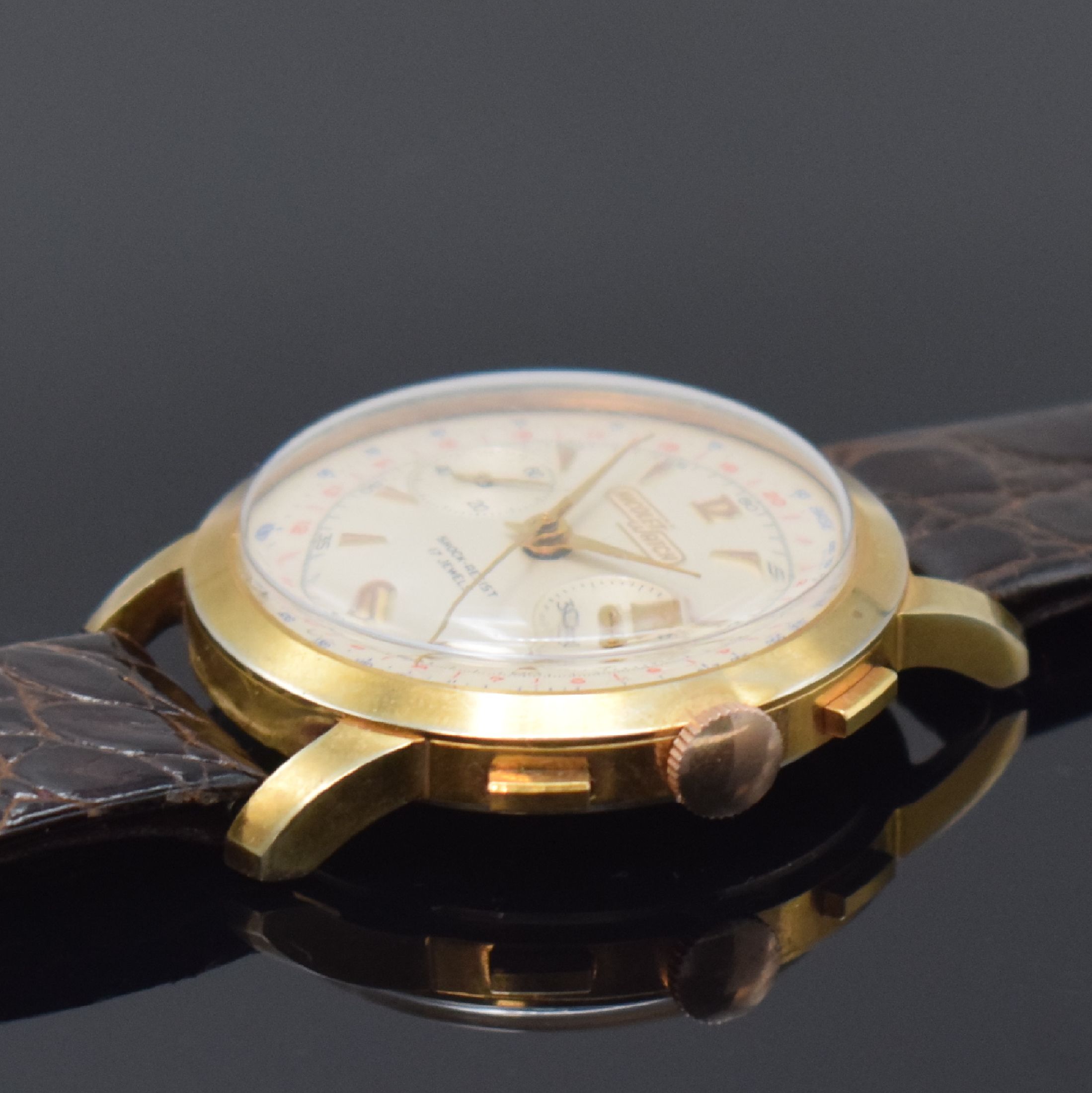 Detail b: NICOLET WATCH Herrenchronograph, Schweiz um 1960, Handaufzug, verg. Gehäuse, Stahlboden aufgedr., silb. Zifferbl. m. aufges. Std.- Ind., gold. ...