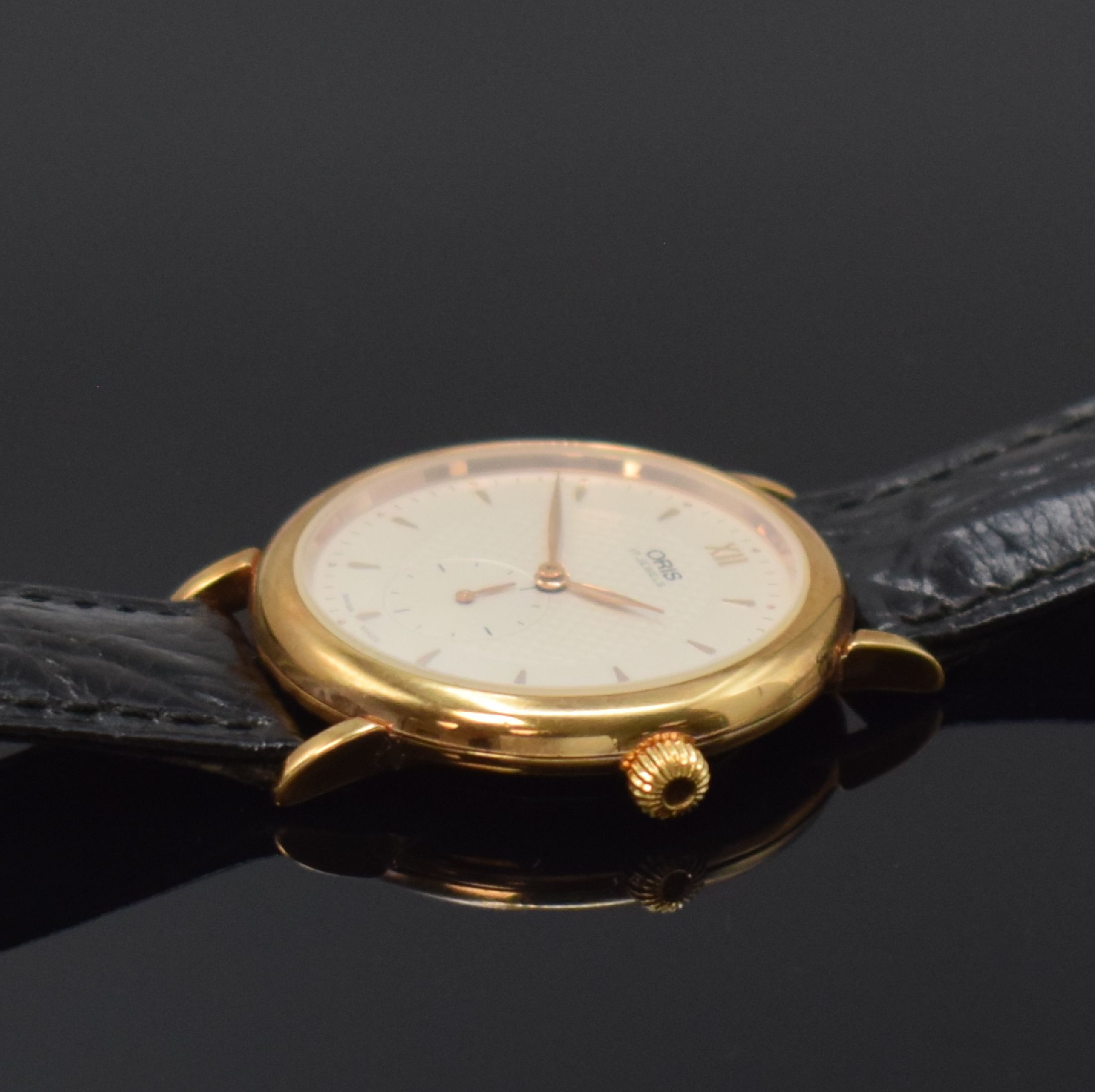 Detail c: ORIS Classic Herrenarmbanduhr Referenz 7423,Schweiz um 2000, Handaufzug, verg. Geh., Edelstahlboden aufgedr., orig. Lederband m. verg. Dornschl., ...