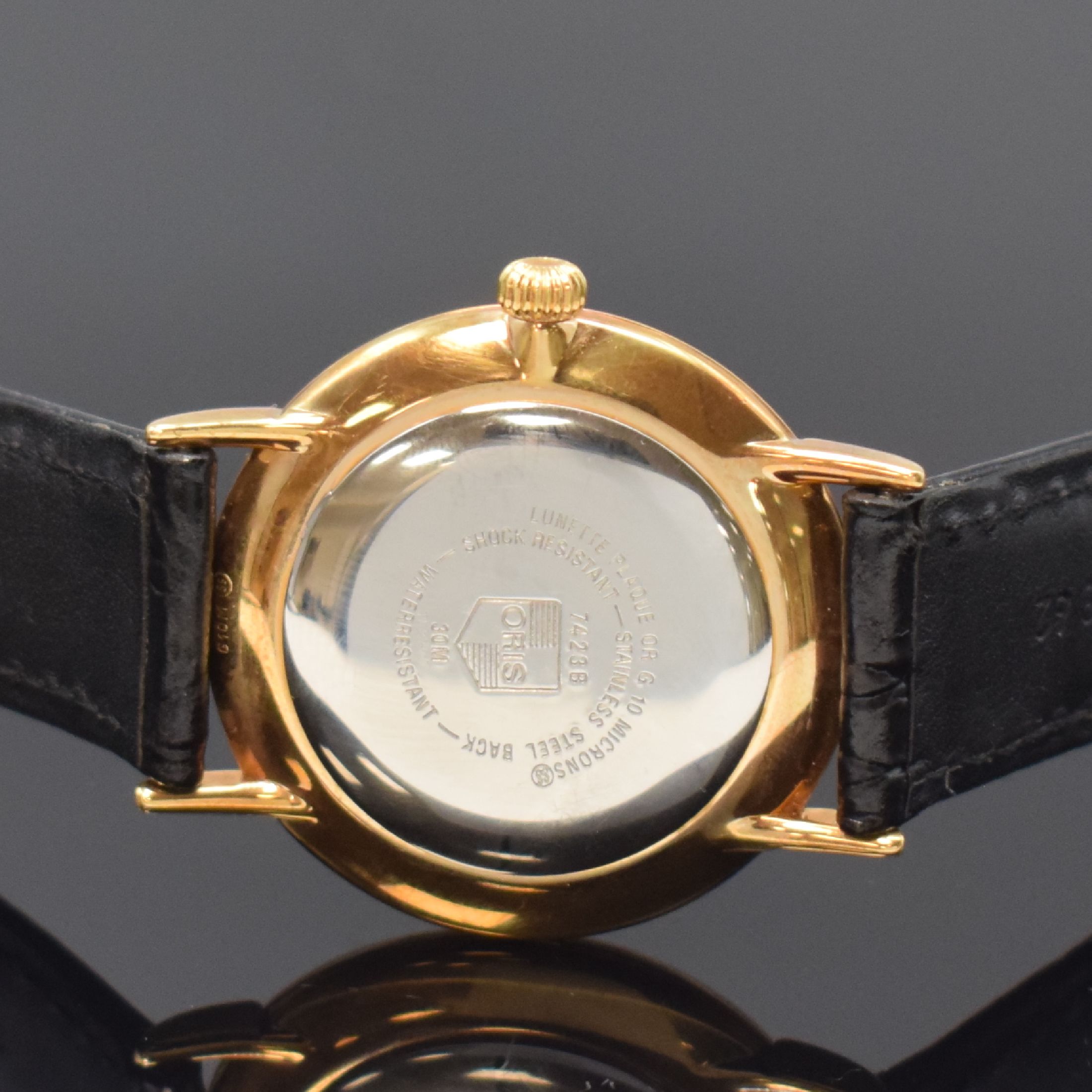 Detail d: ORIS Classic Herrenarmbanduhr Referenz 7423,Schweiz um 2000, Handaufzug, verg. Geh., Edelstahlboden aufgedr., orig. Lederband m. verg. Dornschl., ...