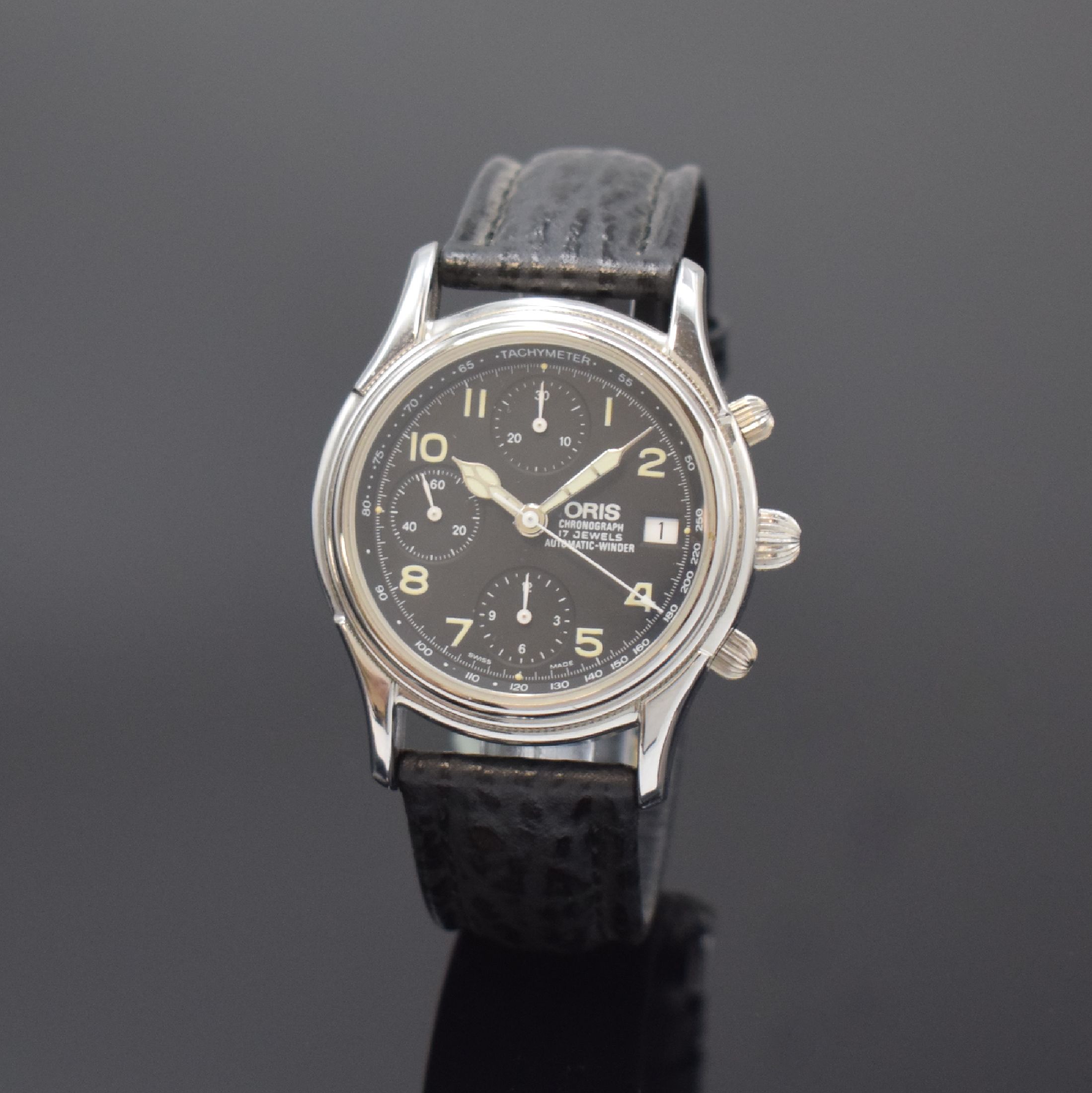 ORIS Armbandchronograph in Stahl Referenz 7415,, Schweiz um 1995, beids. vergl. Geh., Boden verschr., orig. Lederband m. Dornschl., schwarzes ...
