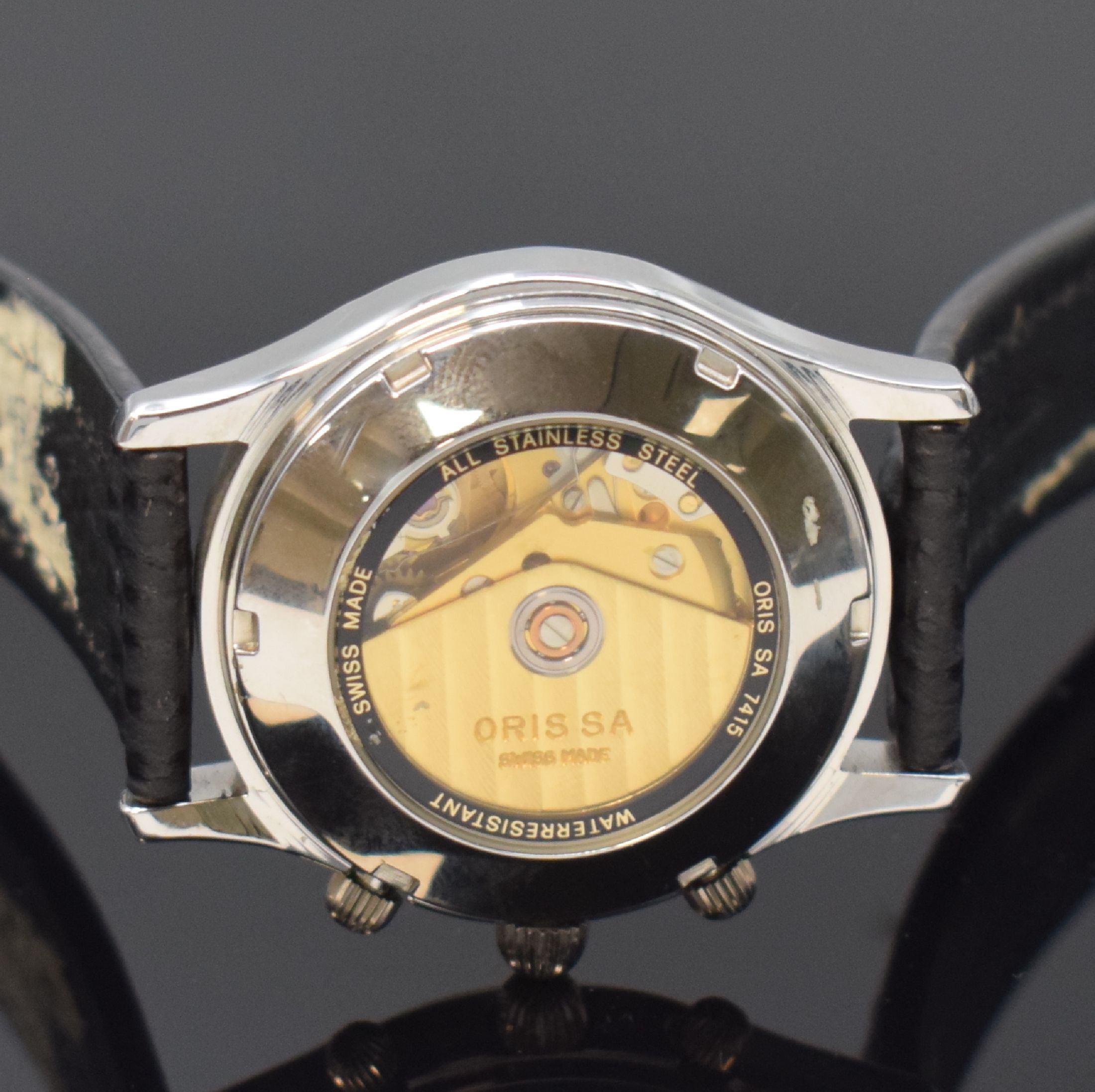 Detail e: ORIS Armbandchronograph in Stahl Referenz 7415,, Schweiz um 1995, beids. vergl. Geh., Boden verschr., orig. Lederband m. Dornschl., schwarzes ...
