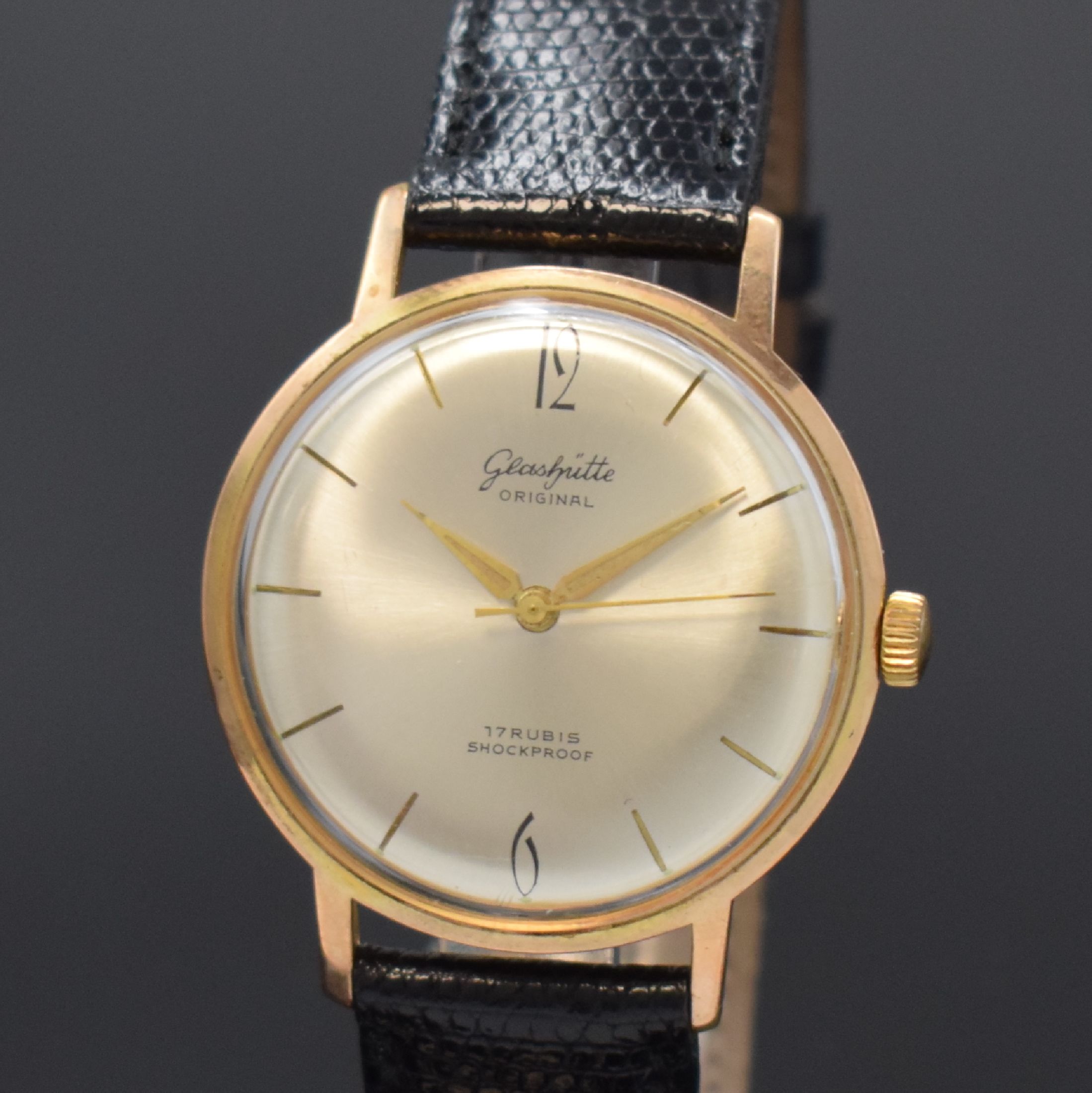 Detail a: GUB GLASHÜTTE/SA vergoldete Herrenarmbanduhr, Deutschland um 1965, Handaufzug, Edelstahlboden aufgedr., silb. Zifferbl. gold. Std.-Ind., gold. ...