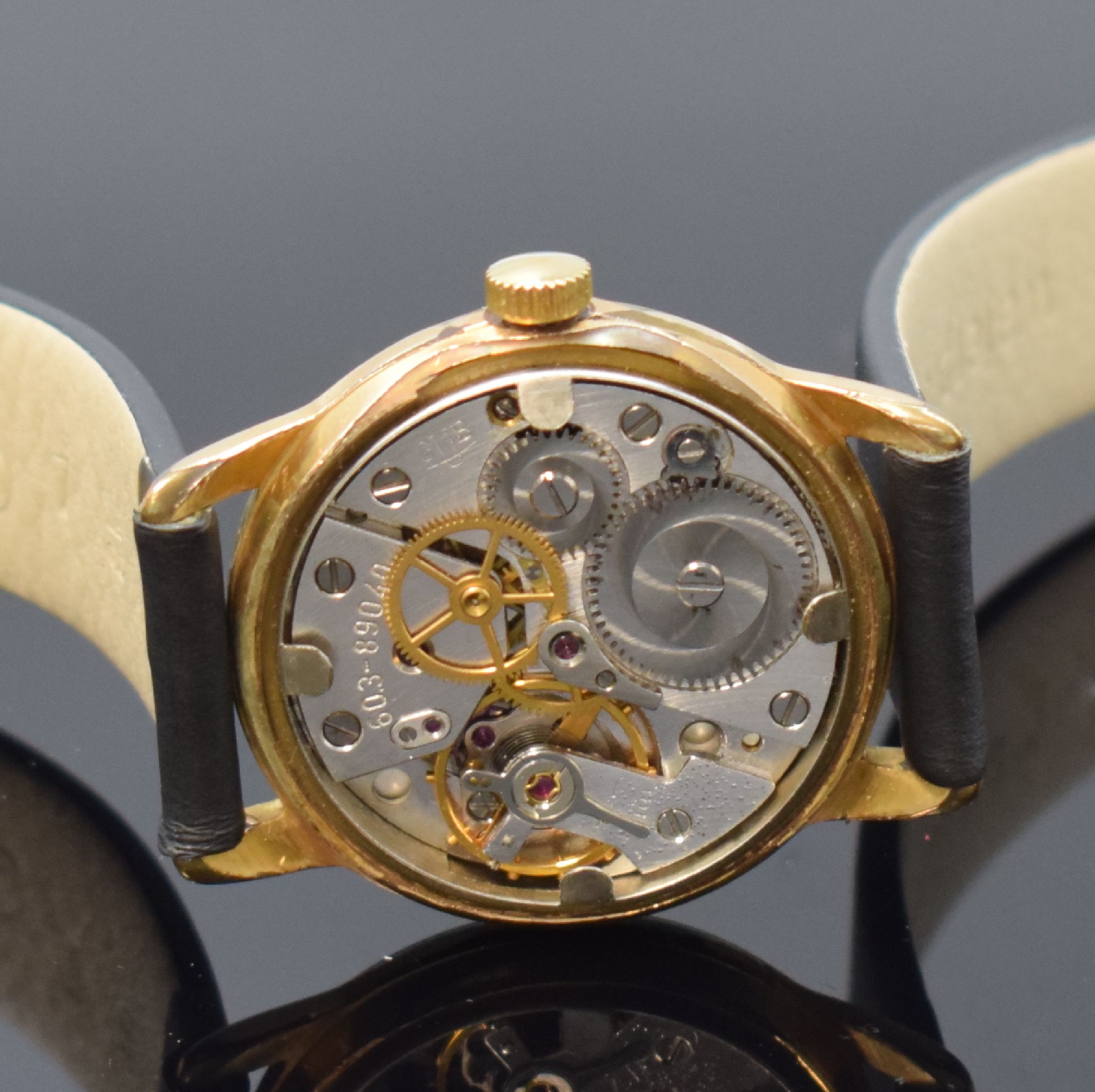 Detail g: GUB 2 vergoldete Armbanduhren, Deutschland um 1960, 1) GUB Kaliber 68.1, Automatik, verg. Geh., aufgedr. Stahlboden, silb. Zifferbl., gold. Indizes ...
