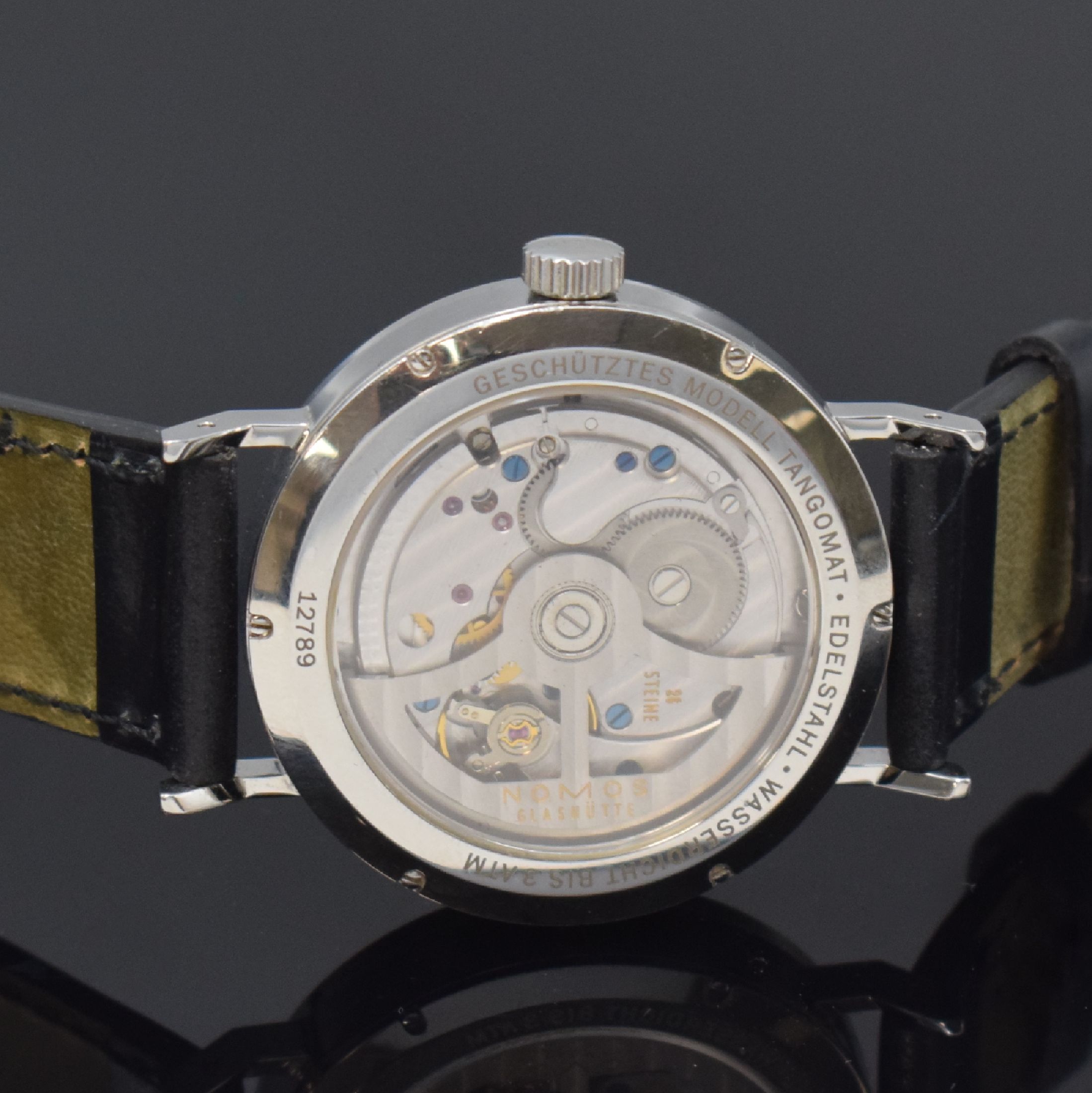 Detail d: NOMOS Glashütte Herrenarmbanduhr Tangomat in Stahl, Deutschland verk. lt. beil. Pap. 12/2012, Automatik, beids. vergl. Geh. inkl. orig. Lederband m. ...
