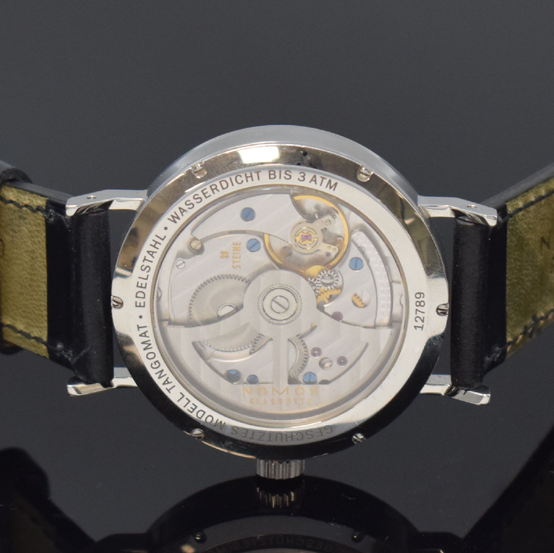 Detail e: NOMOS Glashütte Herrenarmbanduhr Tangomat in Stahl, Deutschland verk. lt. beil. Pap. 12/2012, Automatik, beids. vergl. Geh. inkl. orig. Lederband m. ...