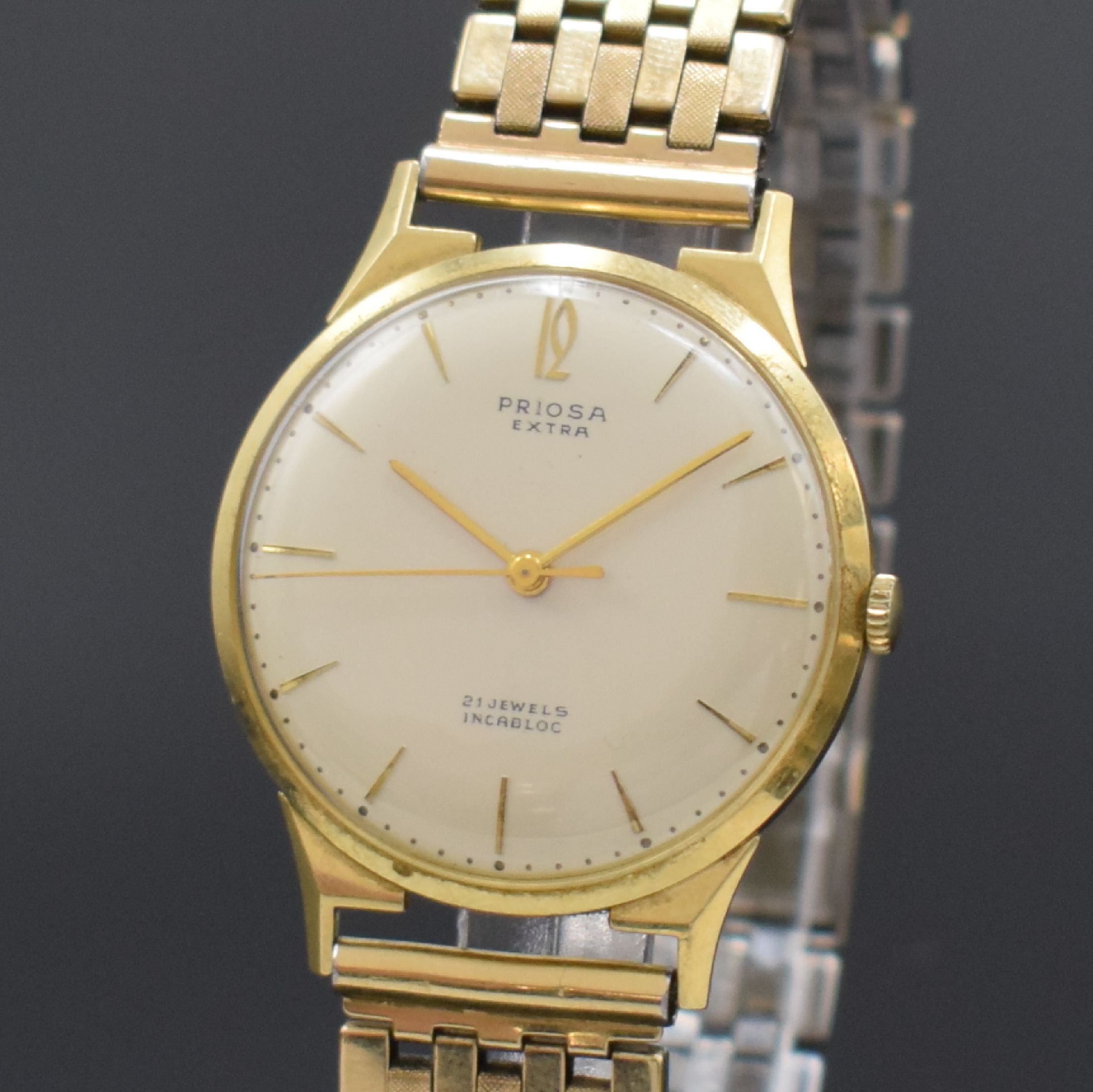 Detail a: PRIOSA Extra Armbanduhr in GG 585/000, Schweiz um 1960, Handaufzug, Boden aufgedr., verg. Flexband, silb. Zifferbl. m. gold. Std.-Ind., gold. Zeiger, ...