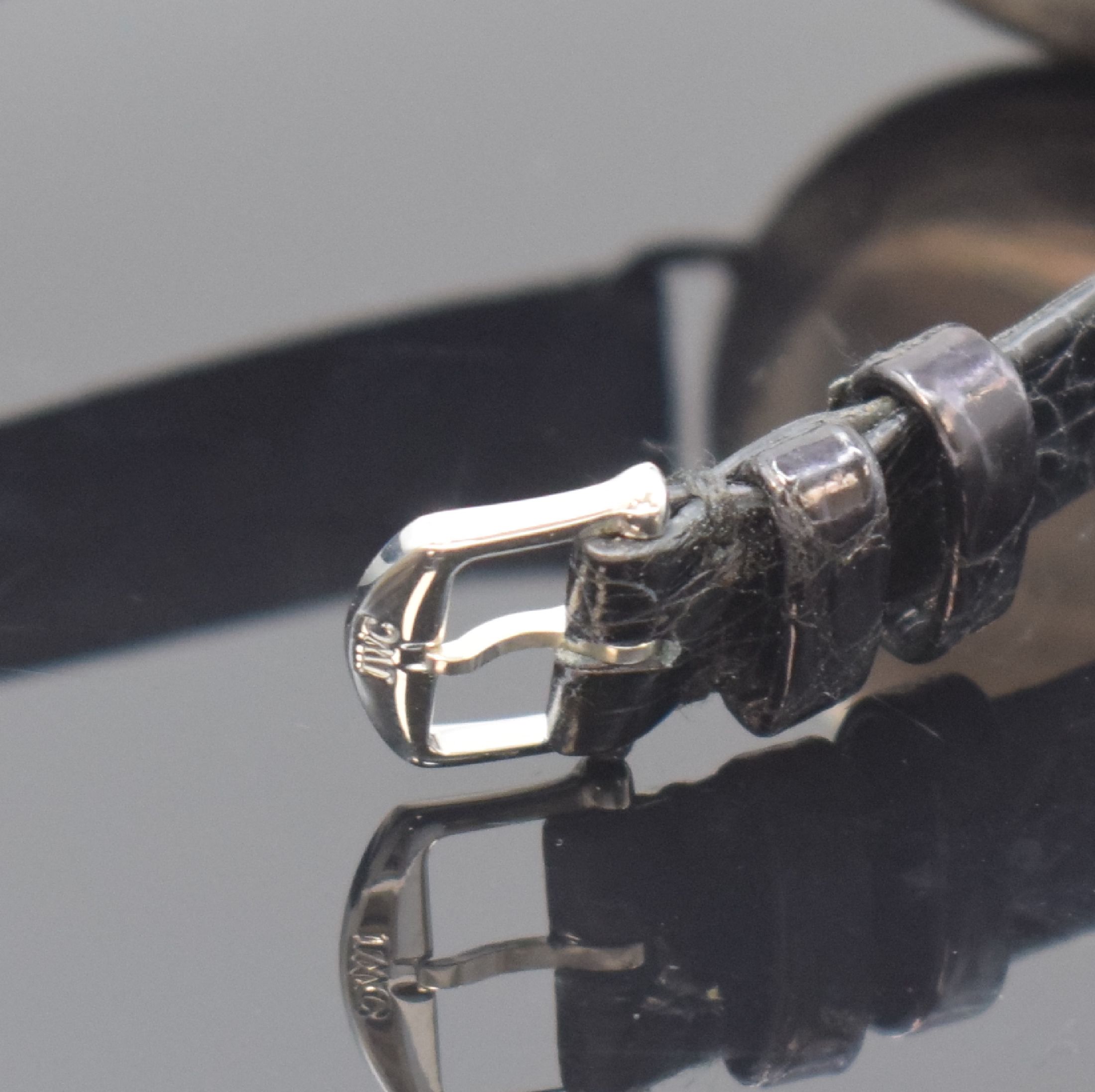 Detail b: IWC / Frodsham / Stauffer & Co. frühe Herrenarmbanduhr, Handaufzug, Schweiz um 1916, verschr. Sterlingsilbergeh. von F. Borgel, schwarzes Zifferbl. ...