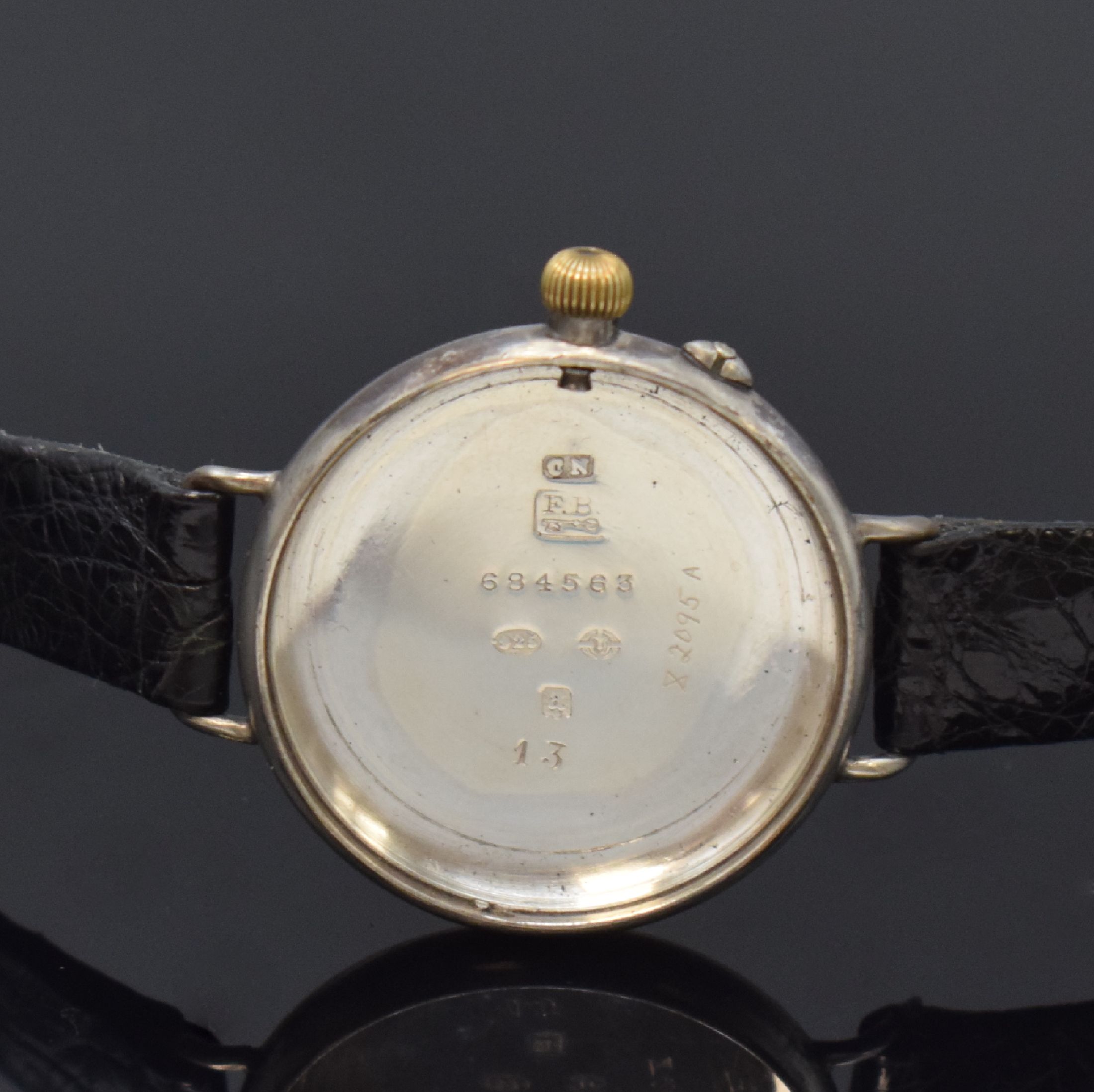 Detail e: IWC / Frodsham / Stauffer & Co. frühe Herrenarmbanduhr, Handaufzug, Schweiz um 1916, verschr. Sterlingsilbergeh. von F. Borgel, schwarzes Zifferbl. ...