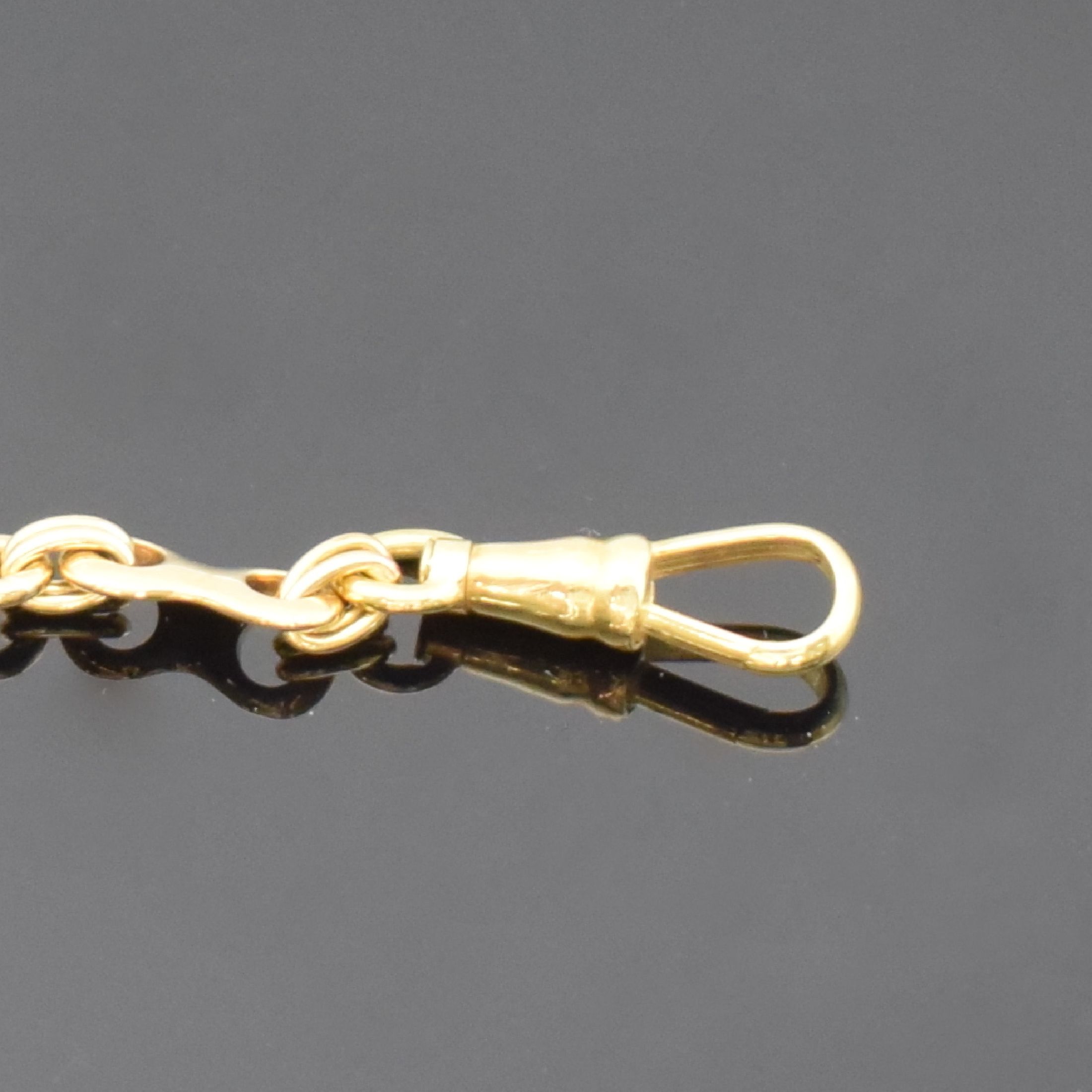Detail b: Taschenuhrkette in GG 750/000, Karabiner und Federring, L. ca. 60 cm, Gew. ca. 50g, aus Sammlungsauflösung