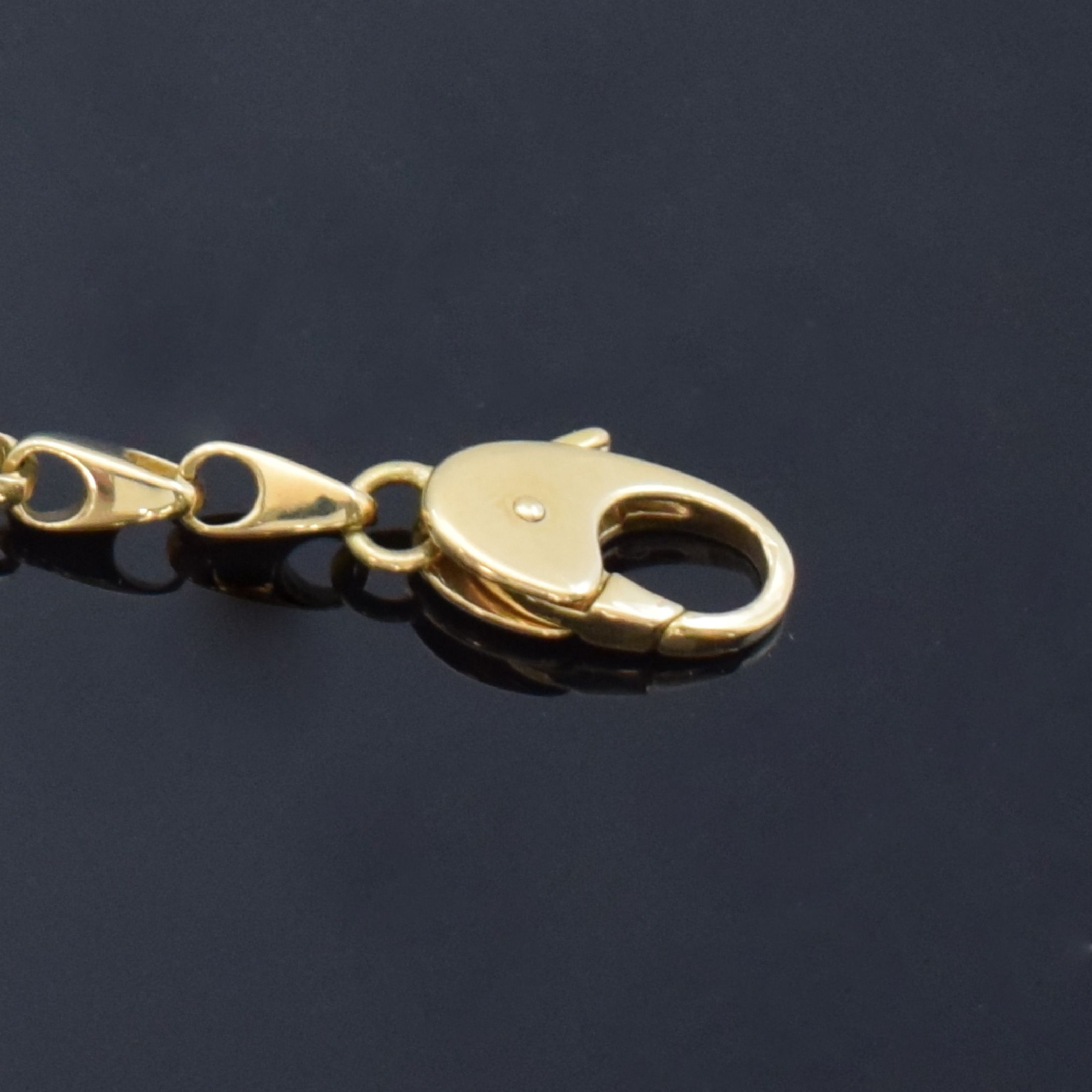 Detail a: Taschenuhrkette in GG 750/000, 2 x Karabiner, L. ca. 55 cm, Gew. ca. 45g, aus Sammlungsauflösung
