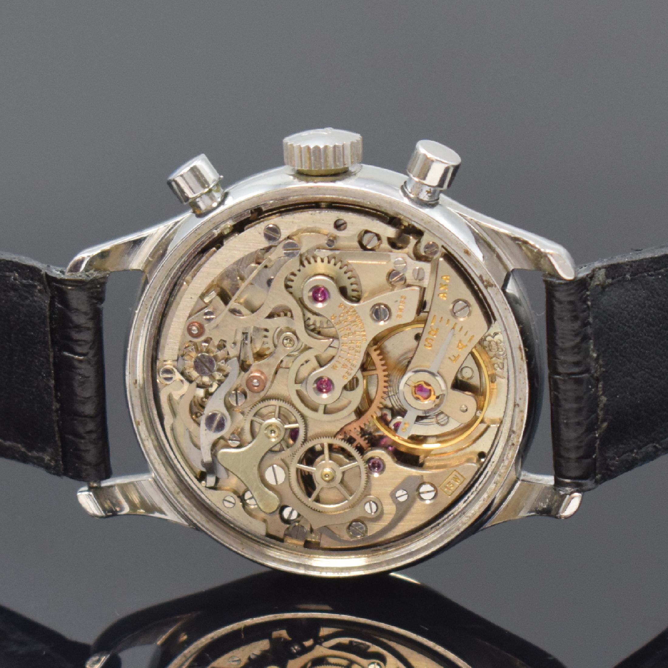 Detail c: WITTNAUER Schaltradchronograph in Stahl, Schweiz um 1960, Handaufzug, verschr. Boden, silb. Zifferbl. m. arab. Leuchtzahlen, gebl. Leuchtzeiger, 12 ...