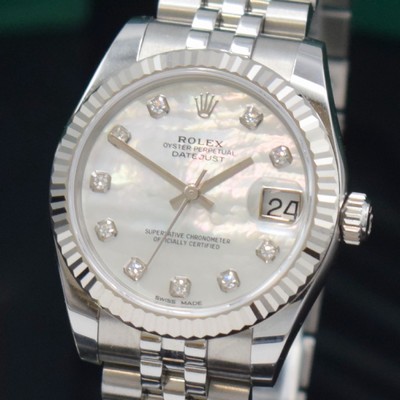 26723064b - ROLEX Datejust 31 reference 178274, self winding, LC 100, superlative chronometer officially certified, stainless steel case including jubilee-bracelet with deployant clasp, fluted white gold-bezel, screwed-down case back & winding crown, mother of pearl dial with 10 in white gold set diamond indices, display of hours, minutes, sweep seconds & date under sapphire loupe glass, diameter approx. 31 mm, length approx. 18,5 cm, original box, Hangtags & papers, sold in October 2019, condition 1-2