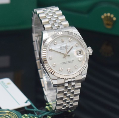 26723064d - ROLEX Datejust 31 reference 178274, self winding, LC 100, superlative chronometer officially certified, stainless steel case including jubilee-bracelet with deployant clasp, fluted white gold-bezel, screwed-down case back & winding crown, mother of pearl dial with 10 in white gold set diamond indices, display of hours, minutes, sweep seconds & date under sapphire loupe glass, diameter approx. 31 mm, length approx. 18,5 cm, original box, Hangtags & papers, sold in October 2019, condition 1-2