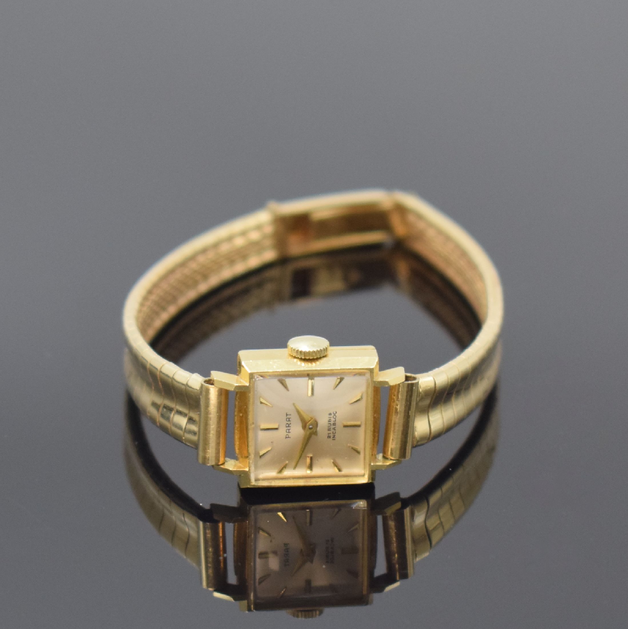 PARAT Damenschmuckuhr in GG 750/000, Schweiz um 1970, gedr. Boden, Goldband in GG 585/000, silb. Zifferbl. m. gold. Std.-Ind. u. Zeigern, rotverg. ...
