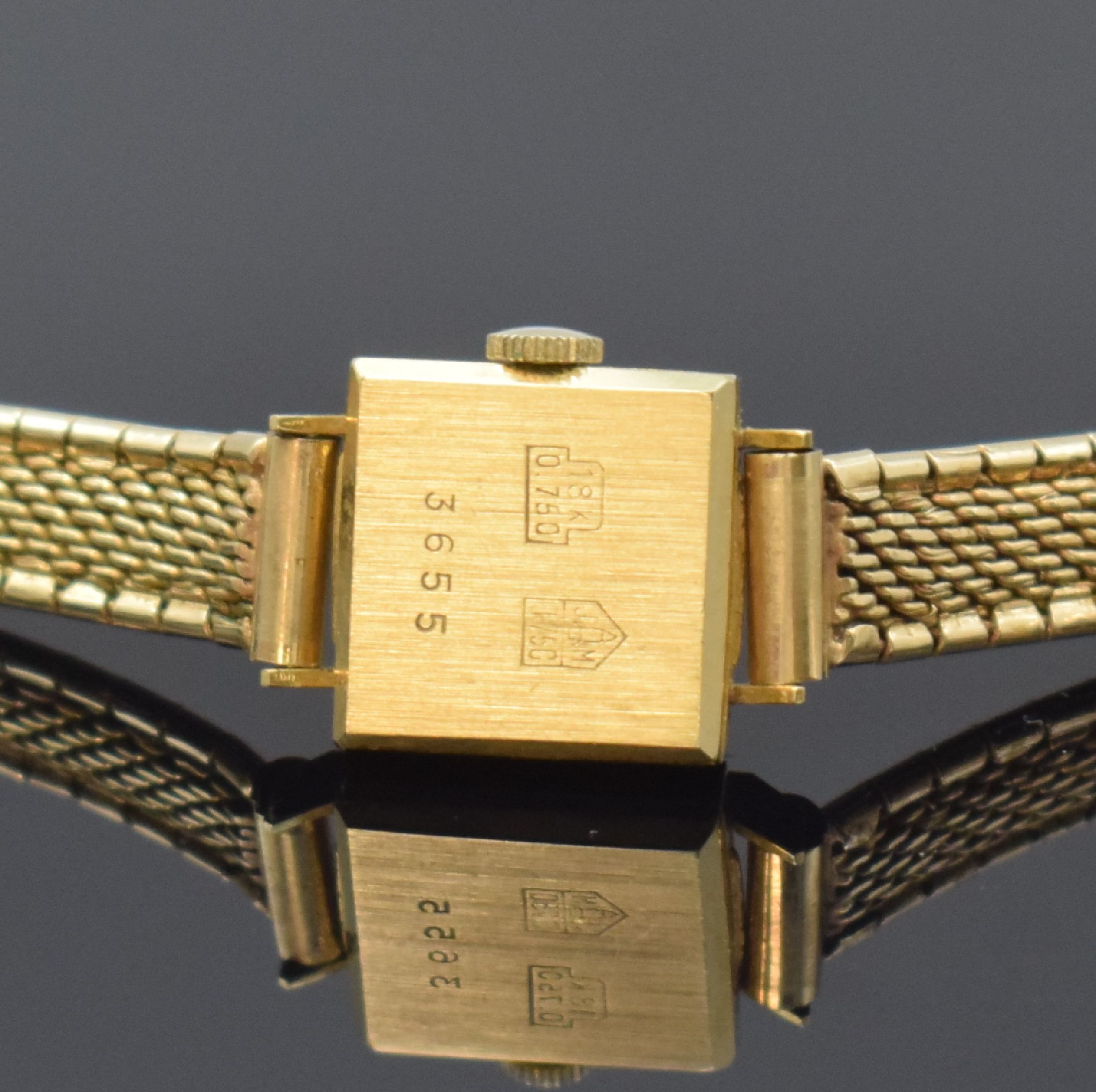 Detail c: PARAT Damenschmuckuhr in GG 750/000, Schweiz um 1970, gedr. Boden, Goldband in GG 585/000, silb. Zifferbl. m. gold. Std.-Ind. u. Zeigern, rotverg. ...