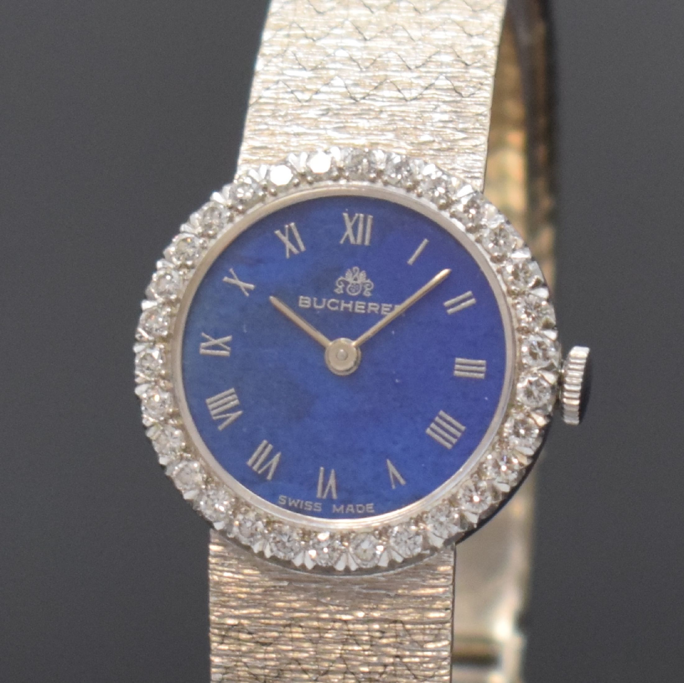 Detail a: BUCHERER Damenschmuckuhr in WG 585/000 mit Diamanten, Schweiz um 1965, Boden aufgedr., Lünette aufw. m. Diamanten bes., Lapislazuli- Zifferblatt m. ...