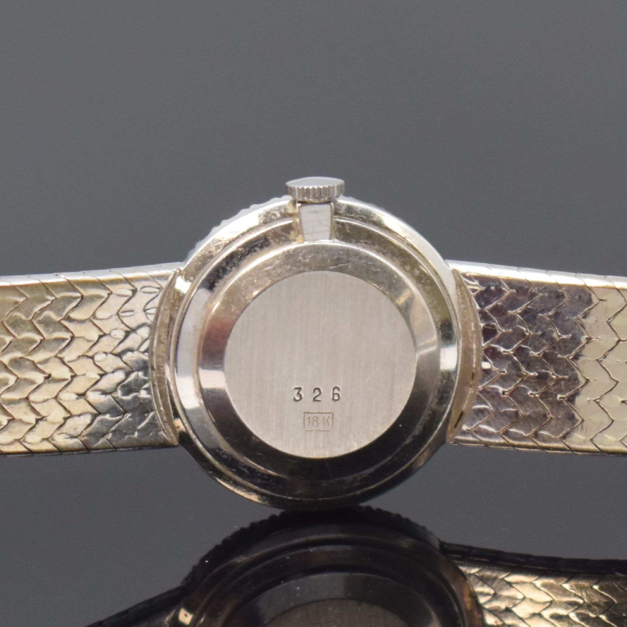 Detail c: BUCHERER Damenschmuckuhr in WG 585/000 mit Diamanten, Schweiz um 1965, Boden aufgedr., Lünette aufw. m. Diamanten bes., Lapislazuli- Zifferblatt m. ...