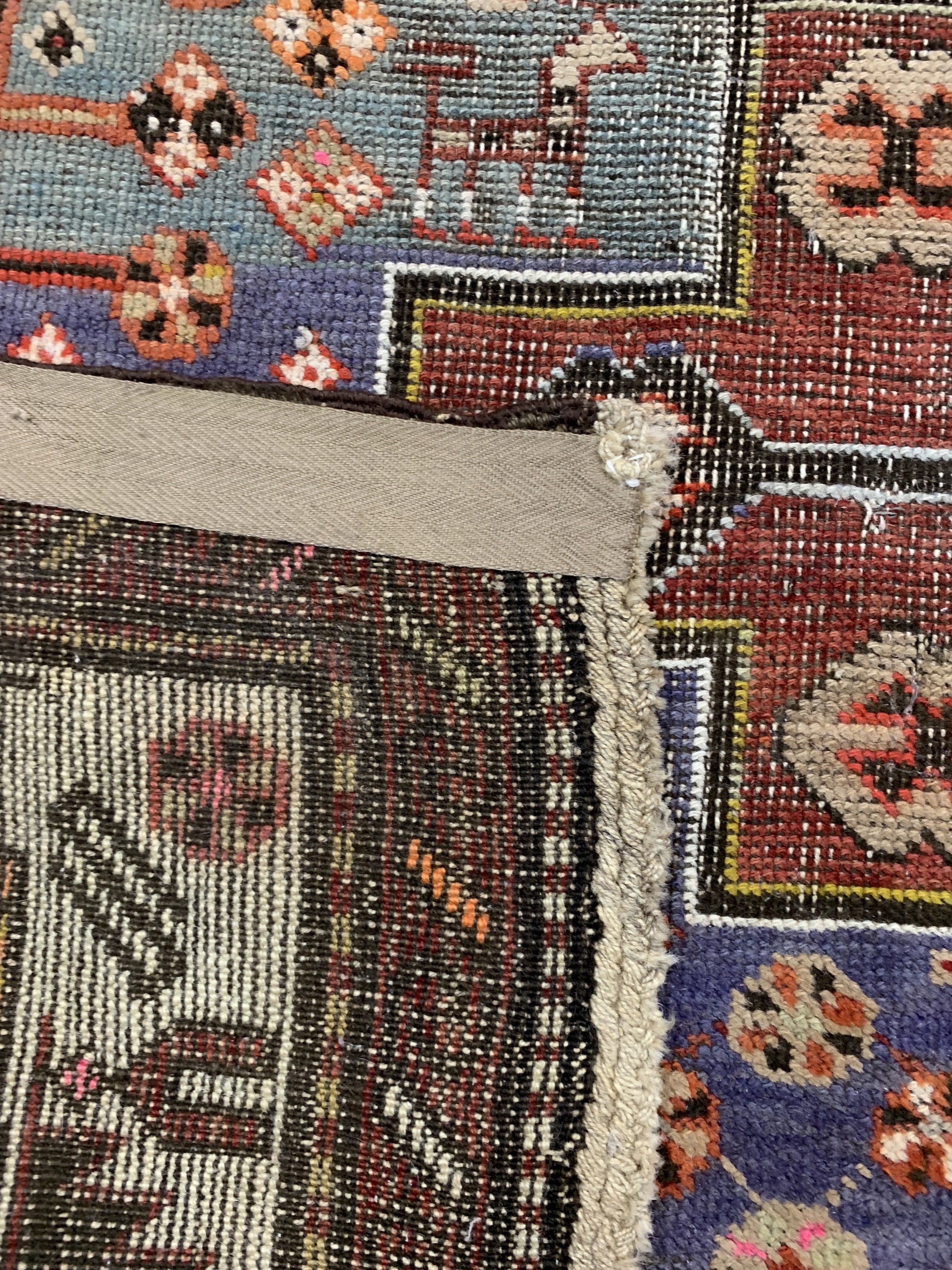 Detail e: Antiker Kazak, Kaukasus, um 1900, Wolle aufWolle, ca. 270 x 156 cm, EHZ: 4