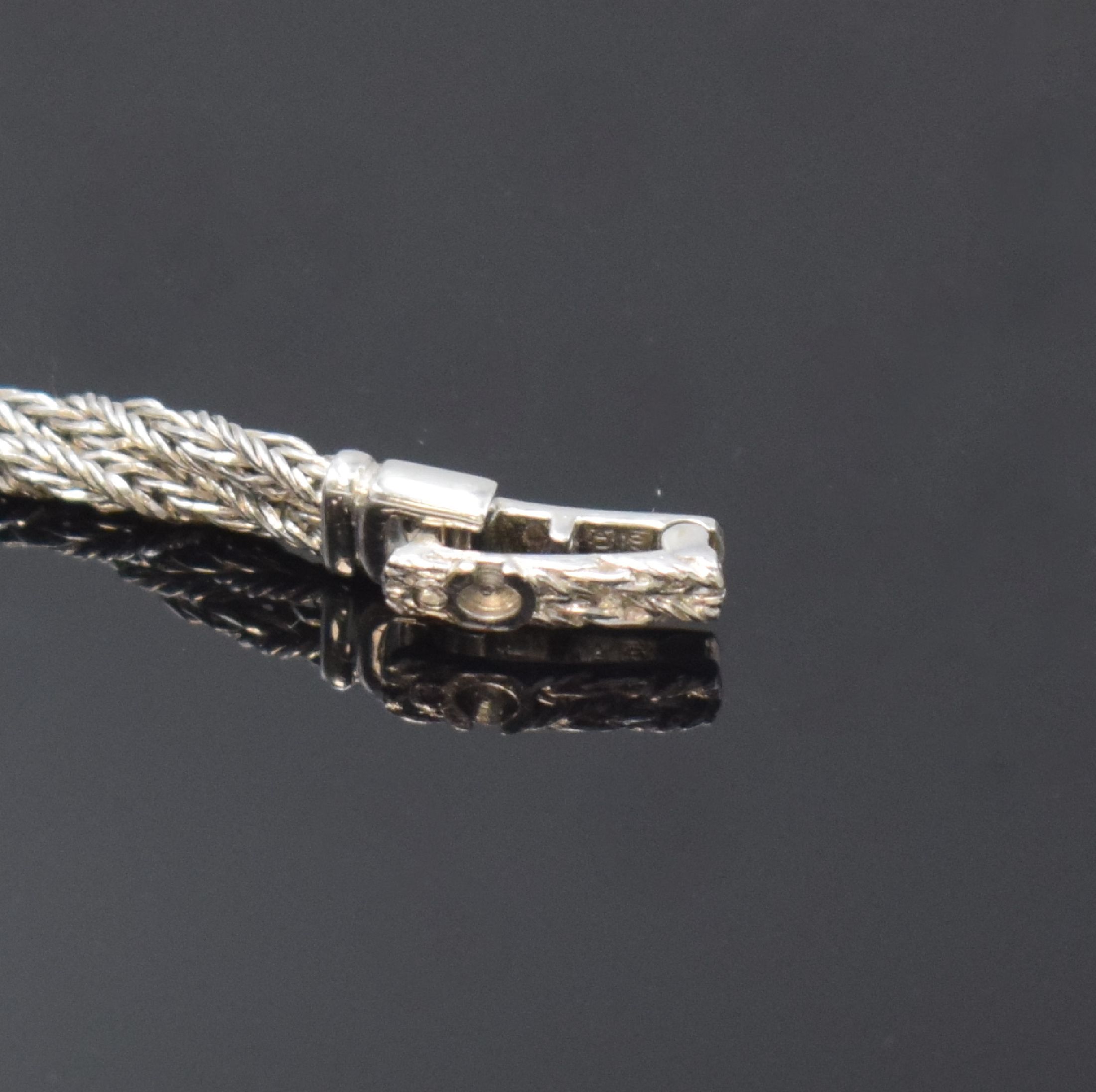 Detail b: CHOPARD Damenschmuckbanduhr in WG 750/000, Schweiz um 1975, Handaufzug, Lünette wie Bandansätze aufw. m. Diamanten bes., Boden aufgedr., verg. ...